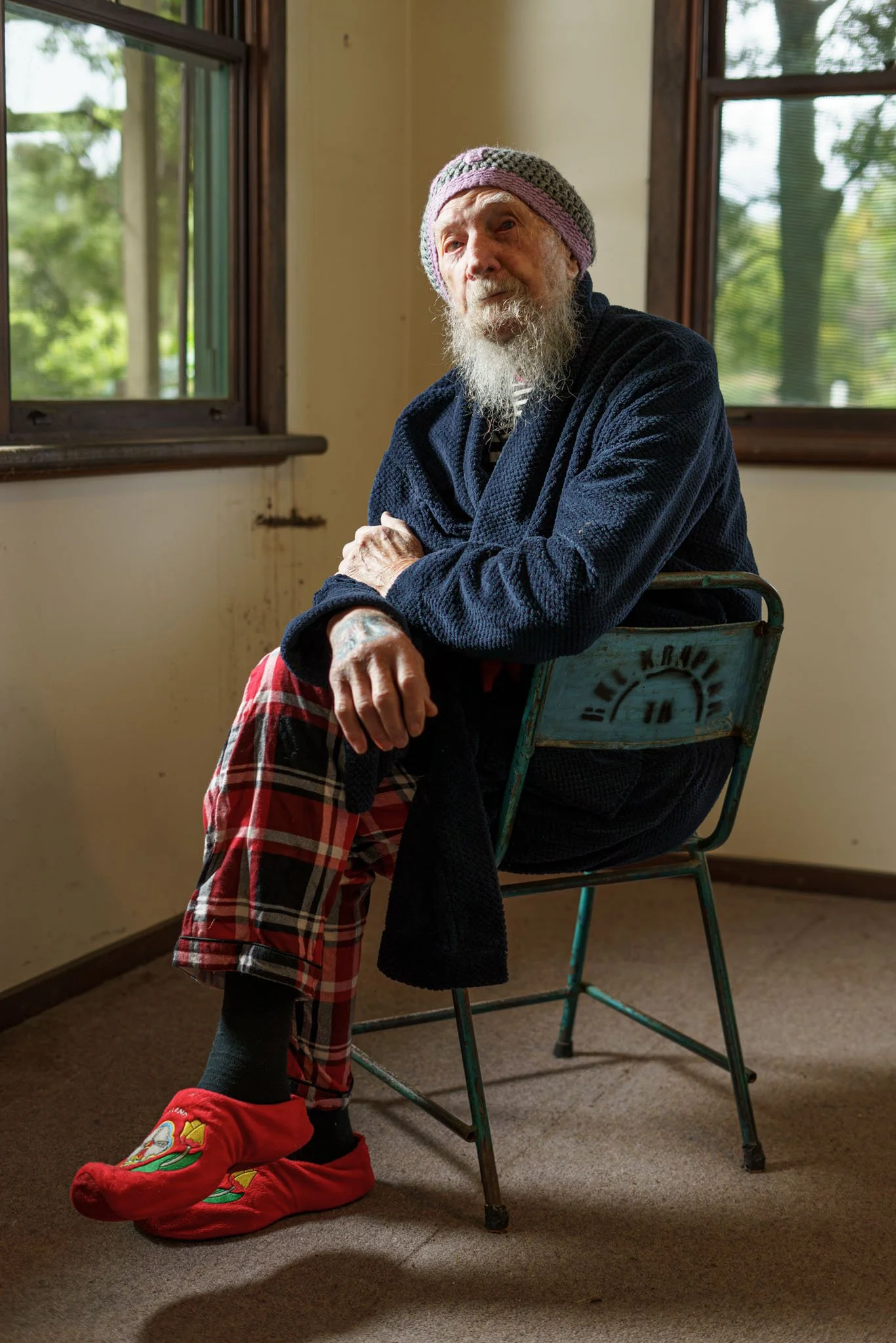 Clothes swamp Baba Desi's house. His former bedroom was cleared to allow the installation of a purpose built walk in wardrobe. The room has beautiful light in the mornings. Taking advantage of the empty room this day l grabbed him before he dressed. 