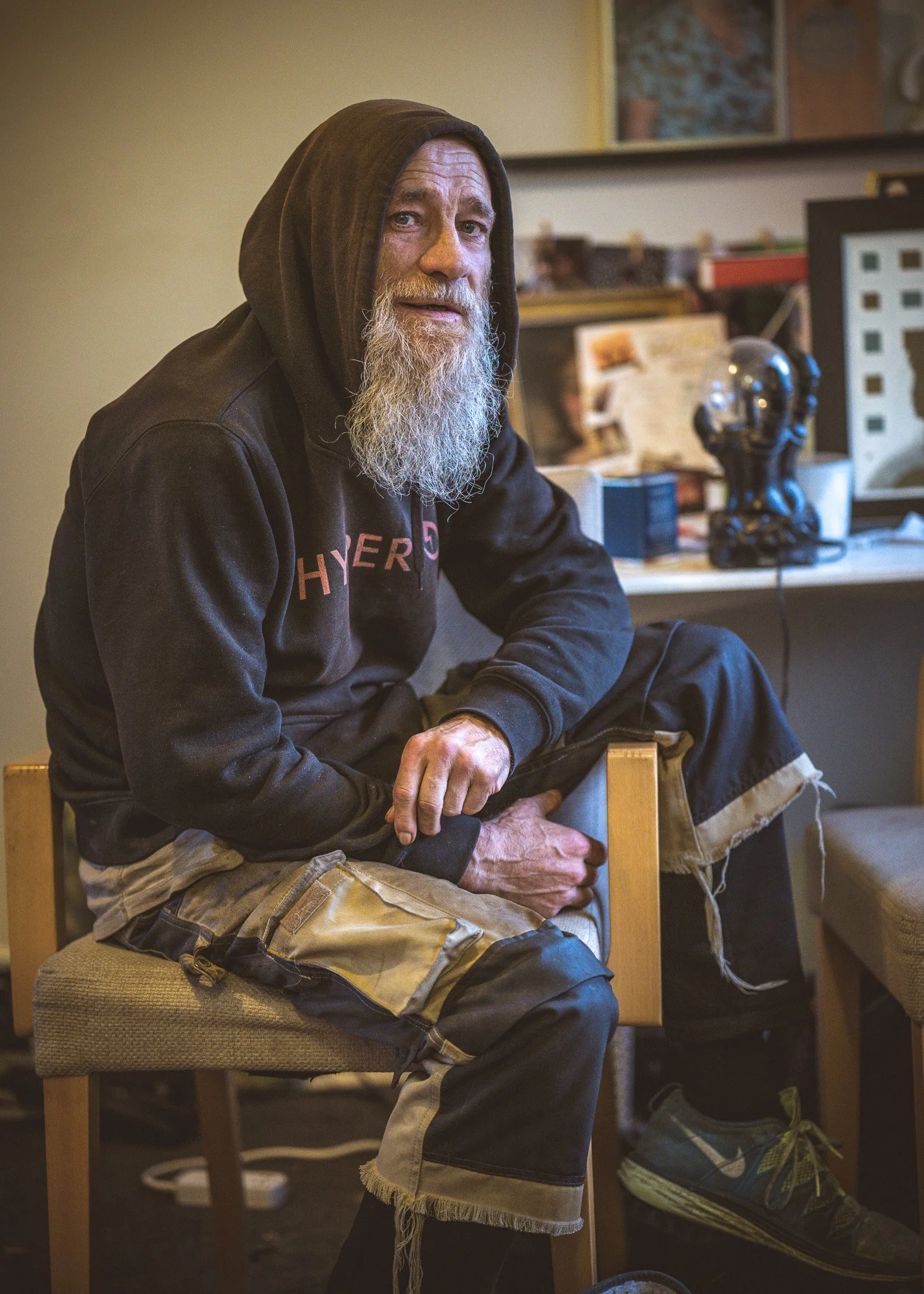 Murray is a pretty relaxed sort of guy. I met him at my local Aldi store. Over a year we got to know each other. He was a beggar. Not ashamed of it either. I asked if l could photograph him at his home and he agreed. On the day l felt quite comfortab