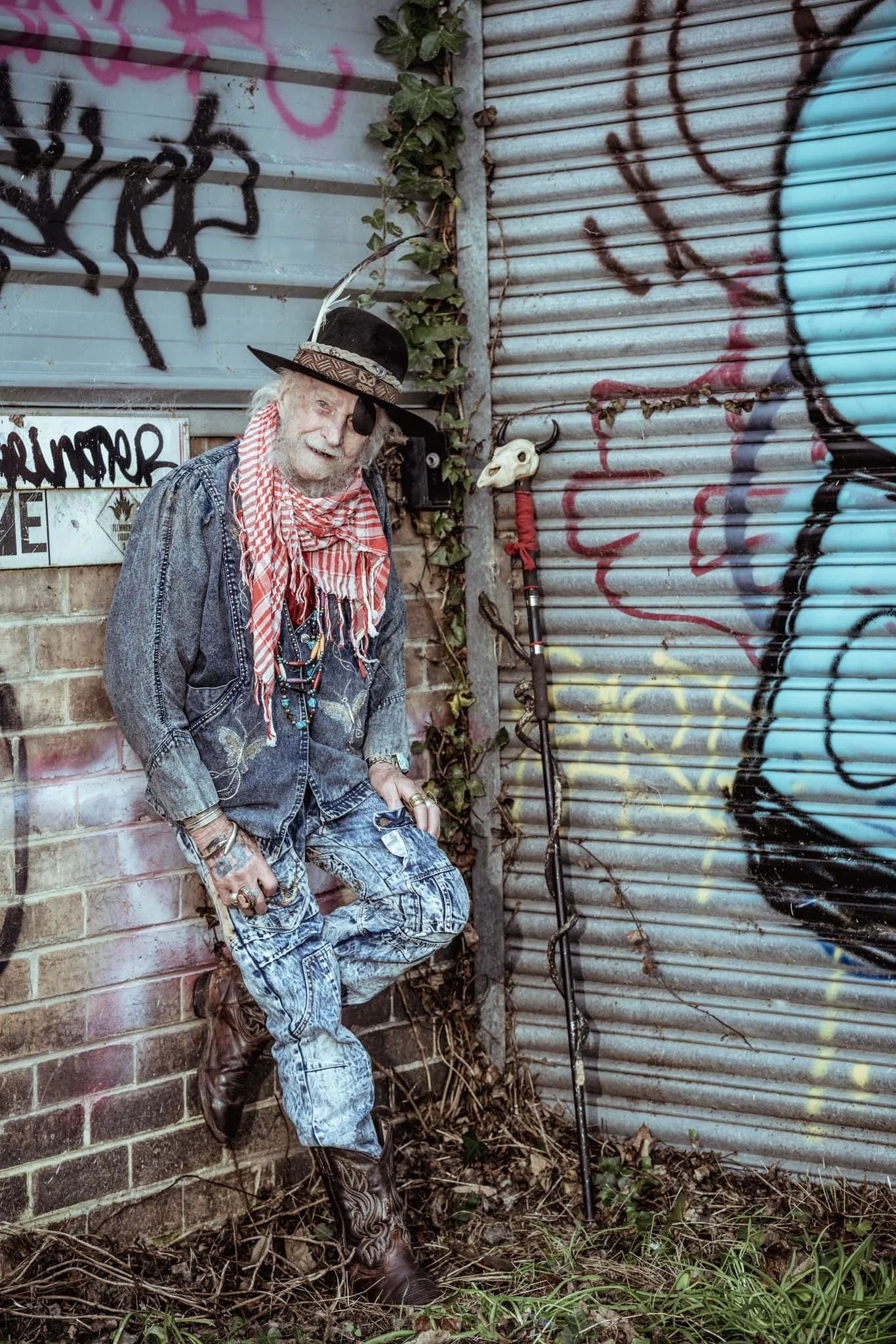 Baba Desi the Belgrave Wizard is at the old bus depot in Belgrave. This place does not exist anymore. Before it closed we paid a visit . The blue of his acid wash double denim is a perfect compliment to the blue hues of the grafitti. A larrikin at he