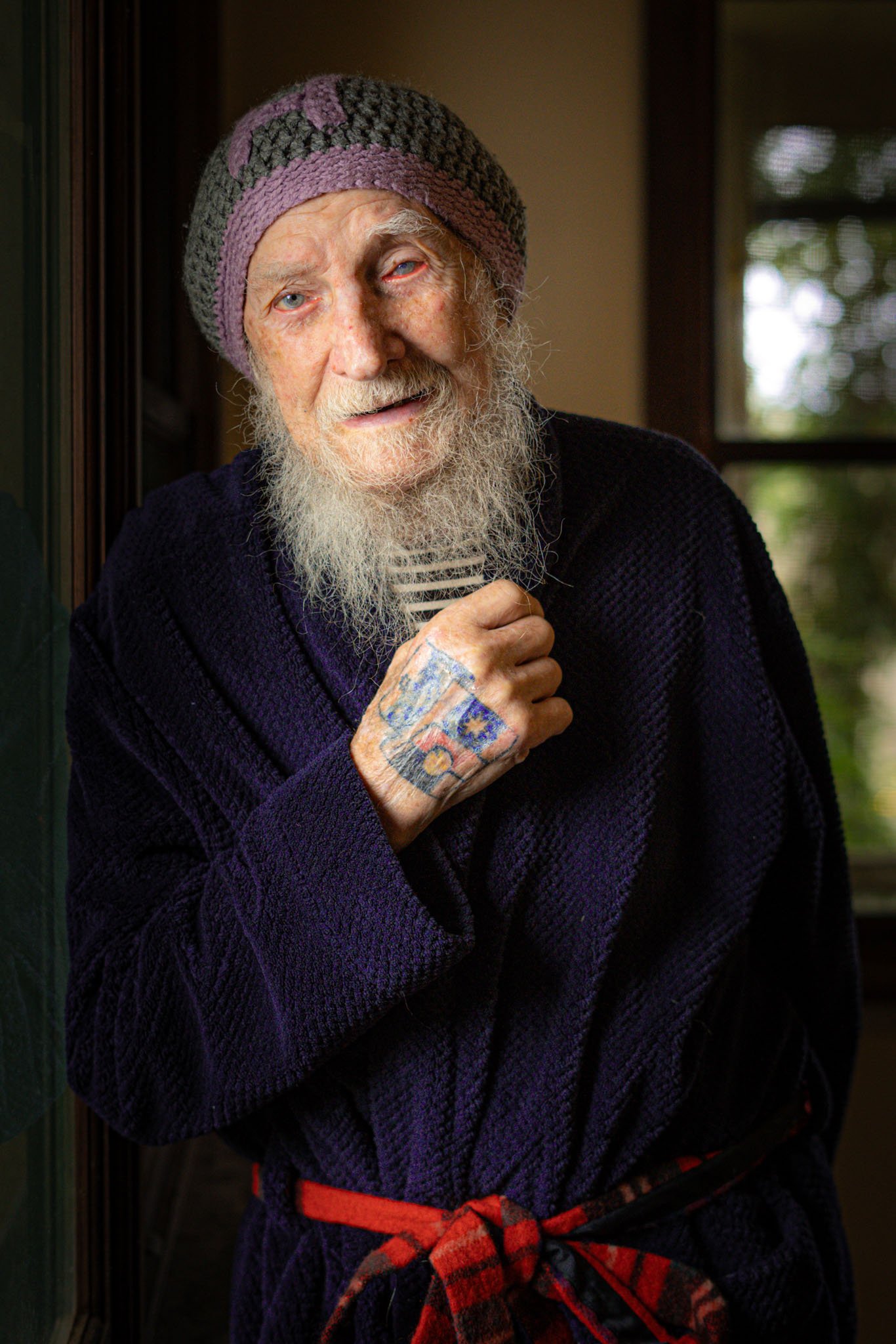 This image is very dear to me. So frail at 93, but still full of life and vitality, he stands in the soft morning glow of light. He is a relic, but also a powerful presence in the misty vales of the Dandenong Ranges.
 His woolly handmade crocheted ha