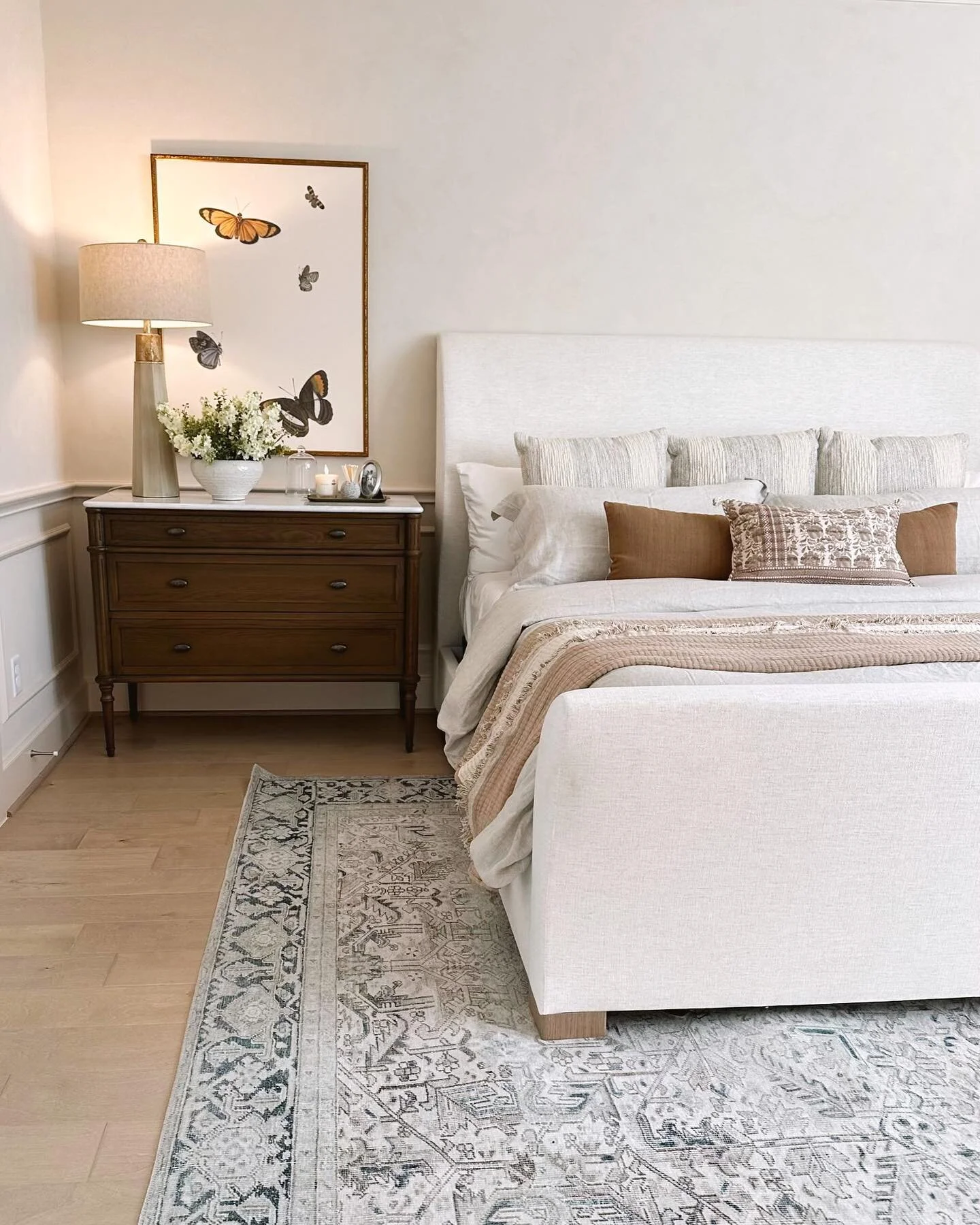 Garden Oaks Primary Bedroom - a soft sanctuary to wind down in the evening and wake in the morning. It is a beautiful blend of warmth, texture and elegance. The wainscoting and lime wash were last minute additions, and we can&rsquo;t imagine the room