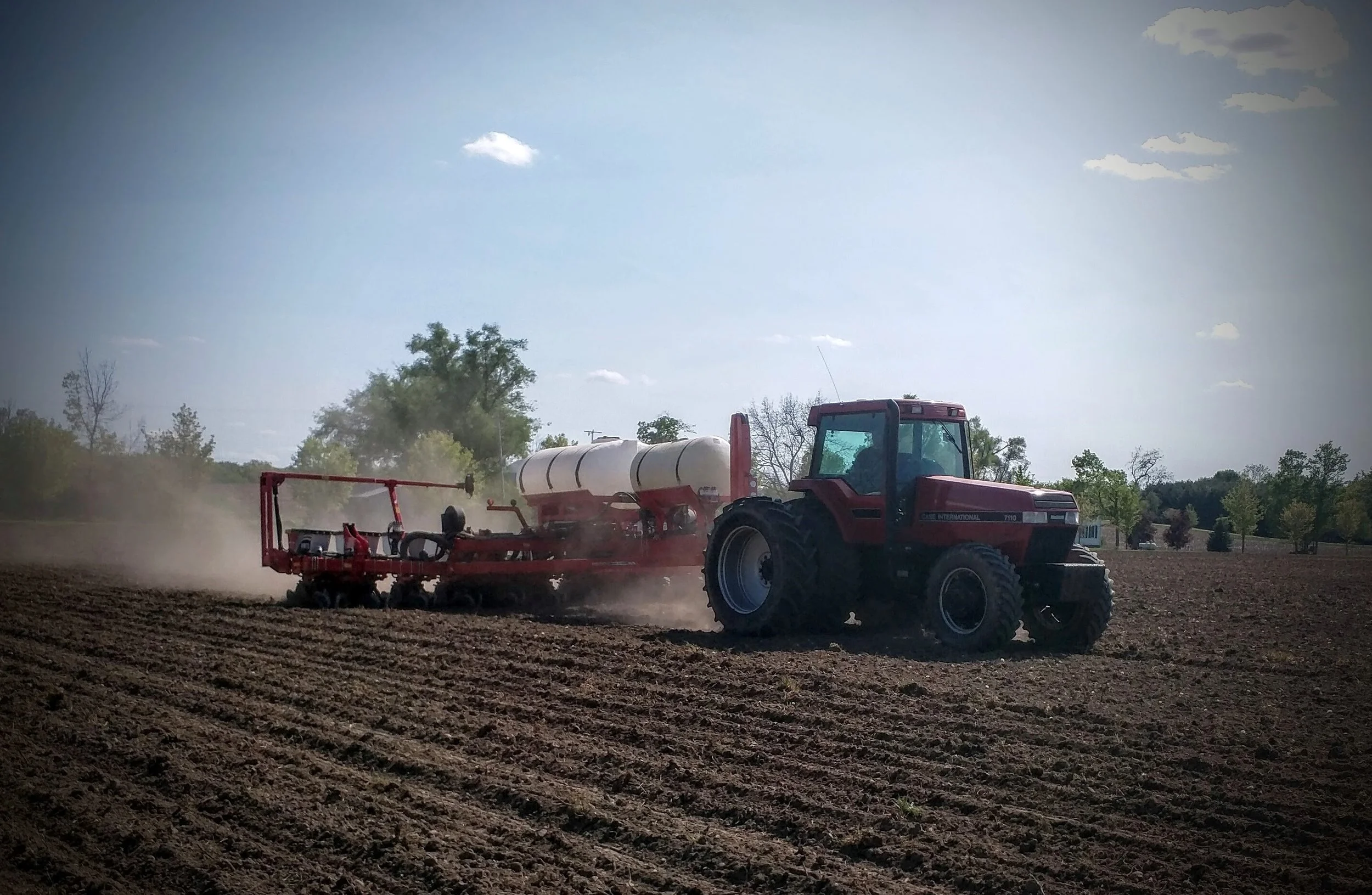 Tractor planting in a field