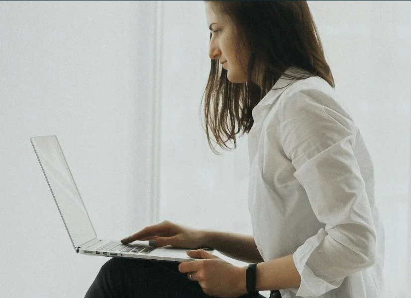 Woman On Computer Doing Telehealth Therapy in MD.jpeg