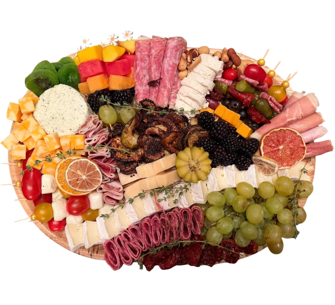 A magnificent charcuterie board with caprese skewers, dried fruit, cheese, meats, and more from Brie & Burrata in San Diego.