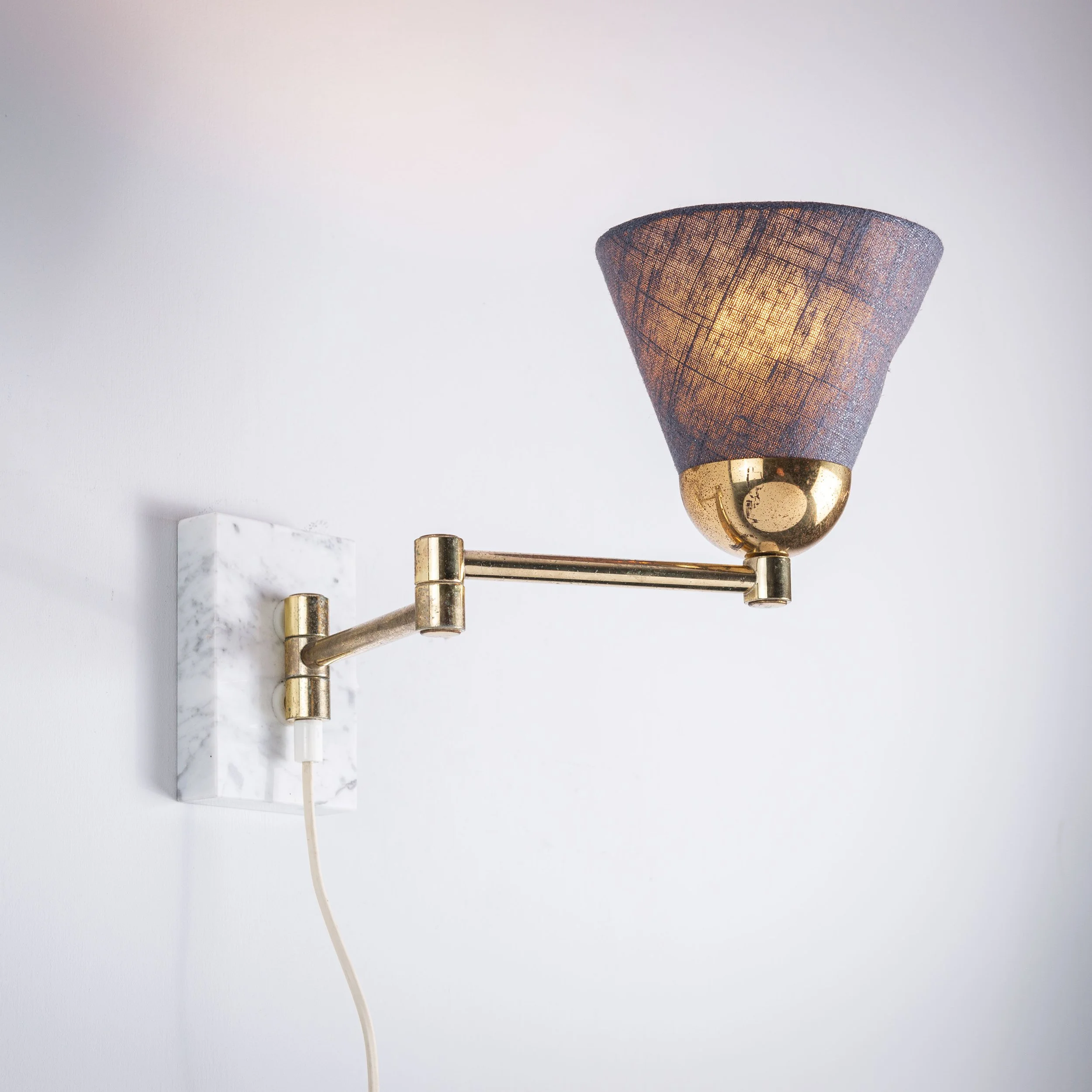 Folding arm wall lamp with marble base