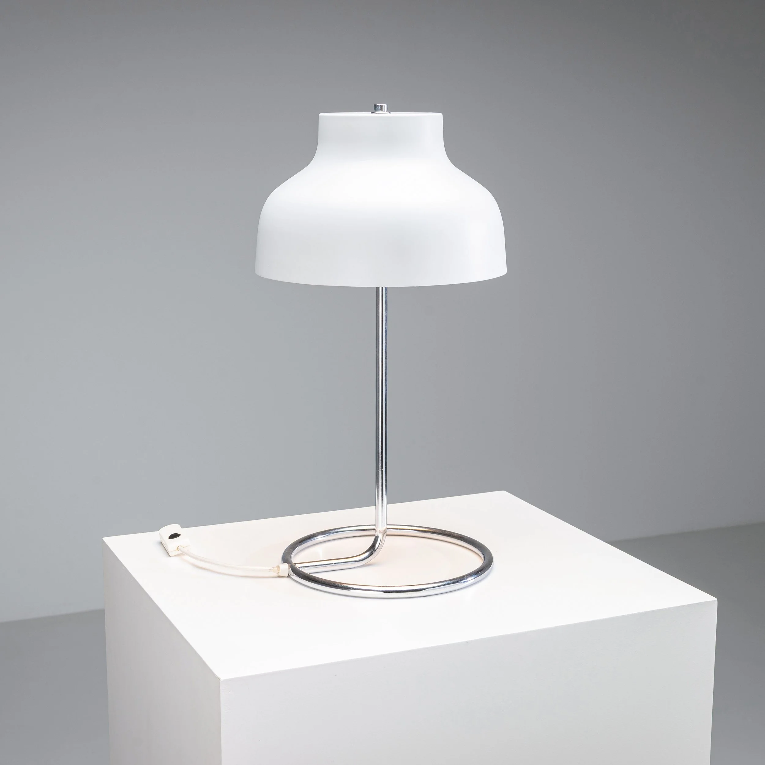Chromed table lamp metal shade and curved frame