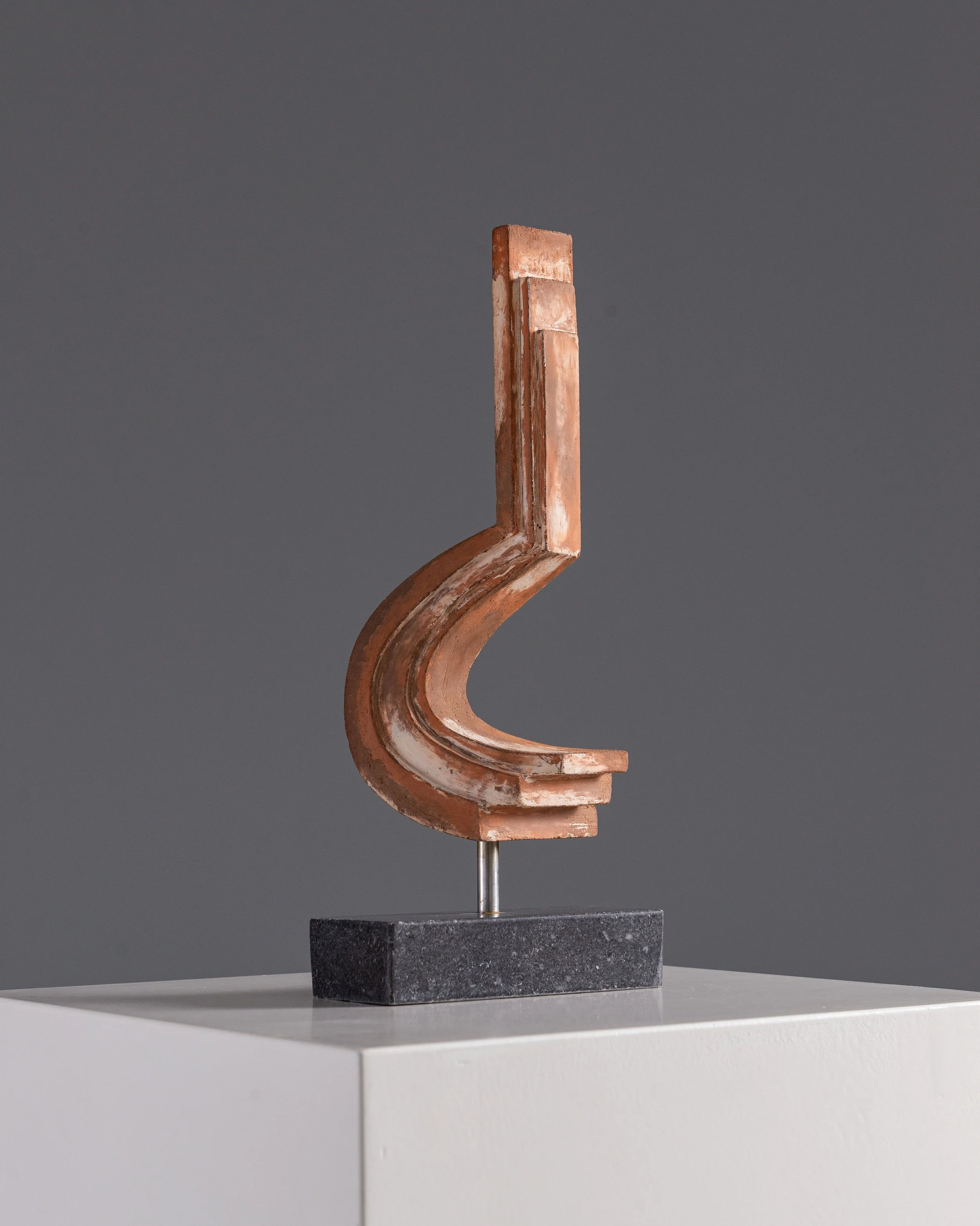 Terracotta sculpture on granite base