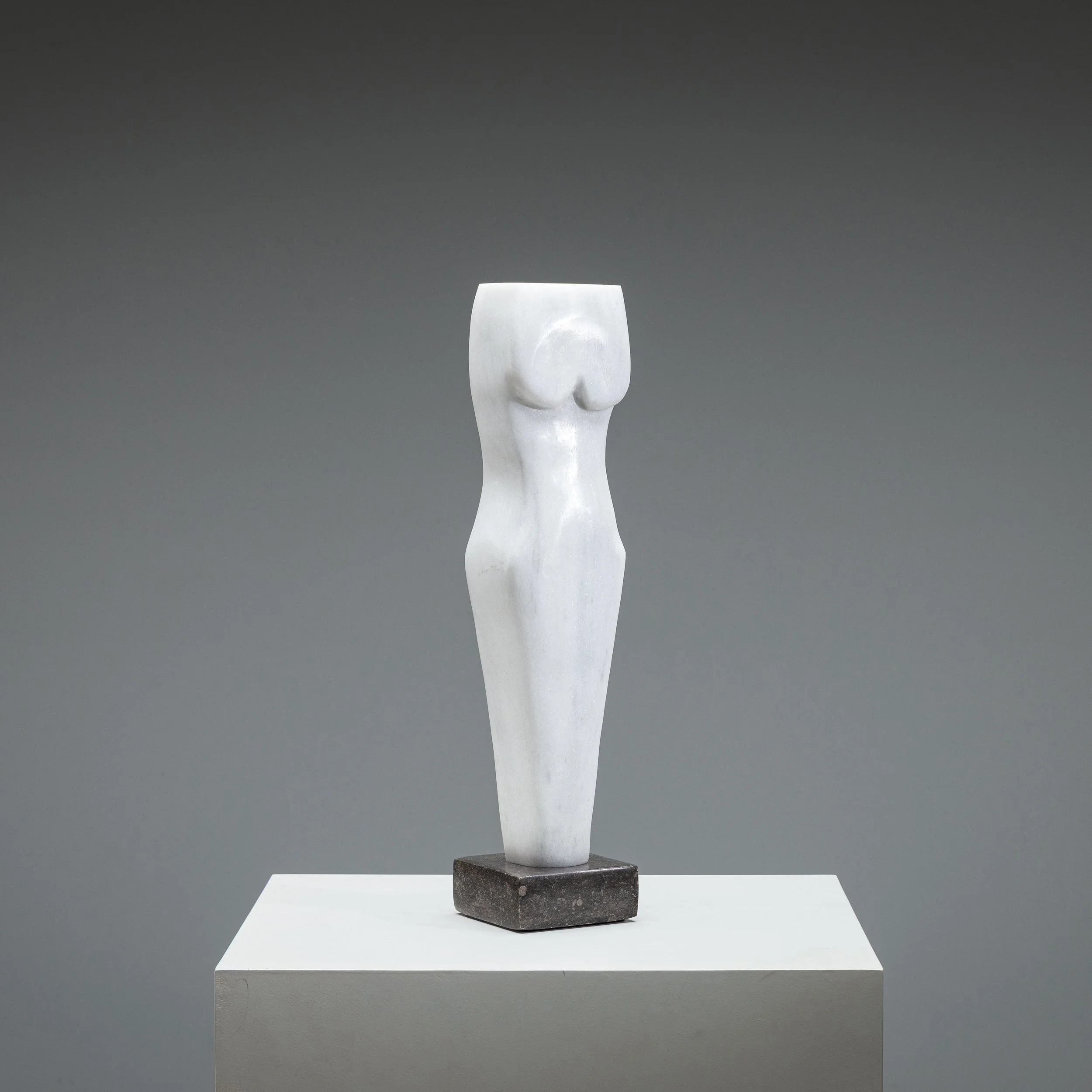 Abstract solid white marble torso