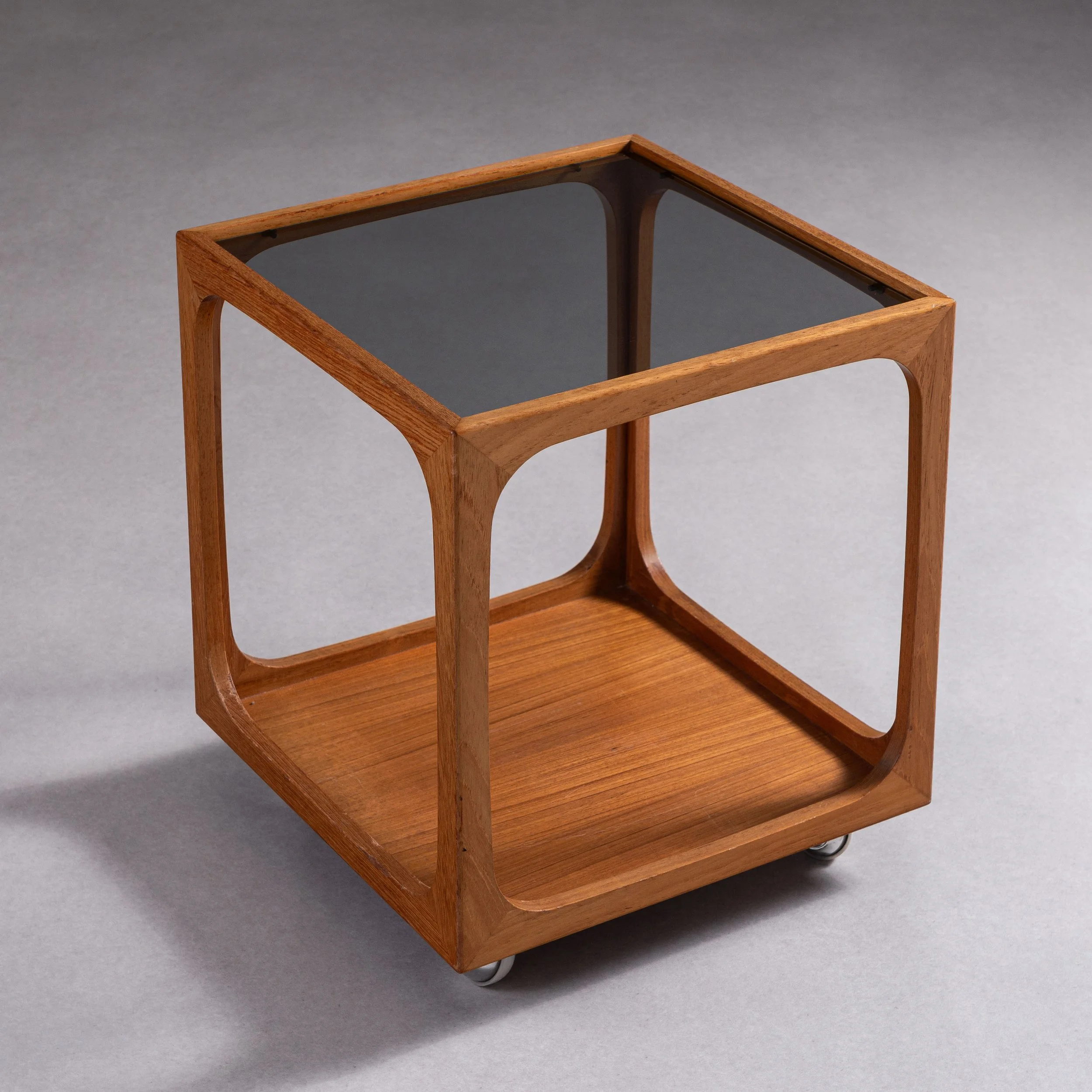 Rolling sidetable with smoked glass top
