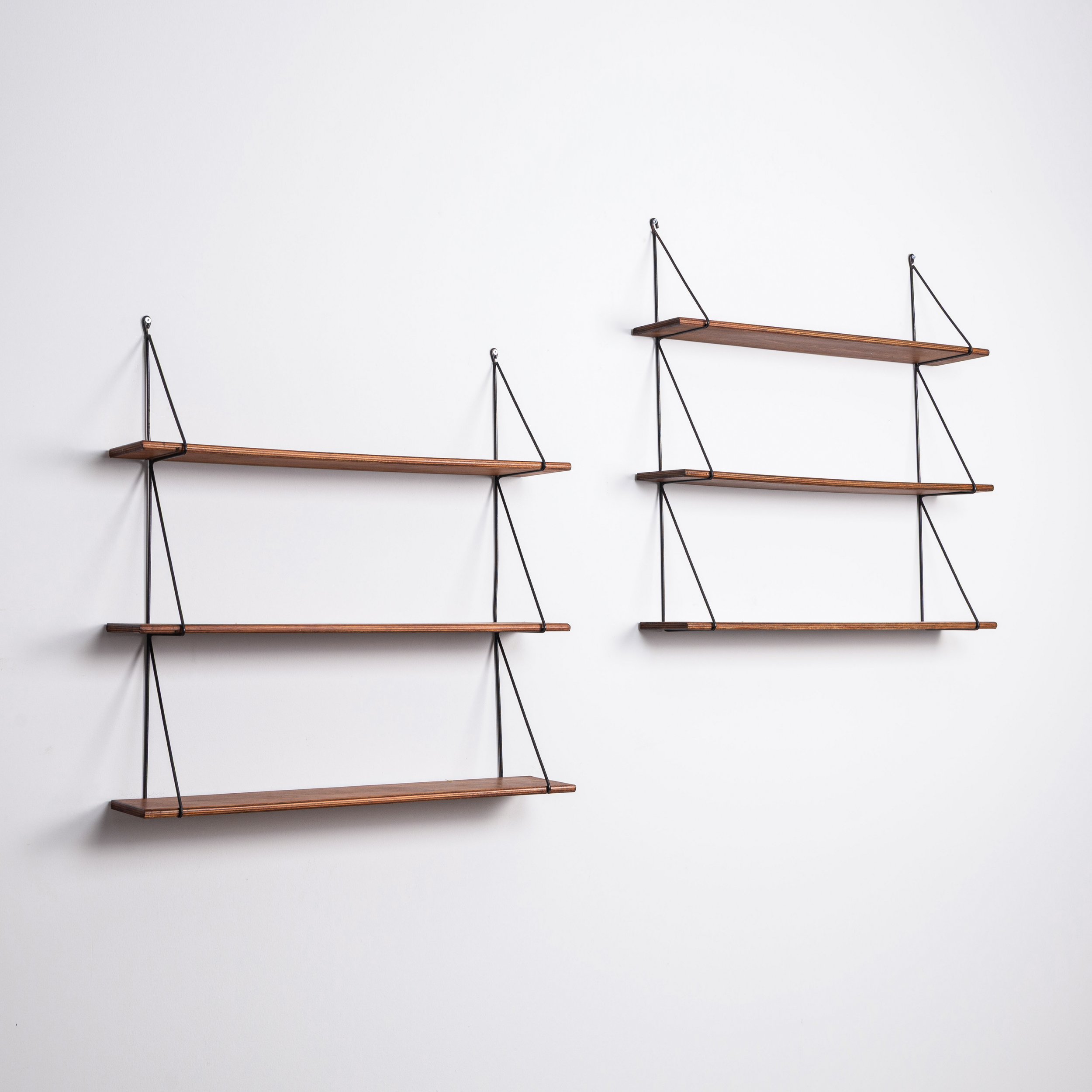Set of minimalistic wooden shelving units