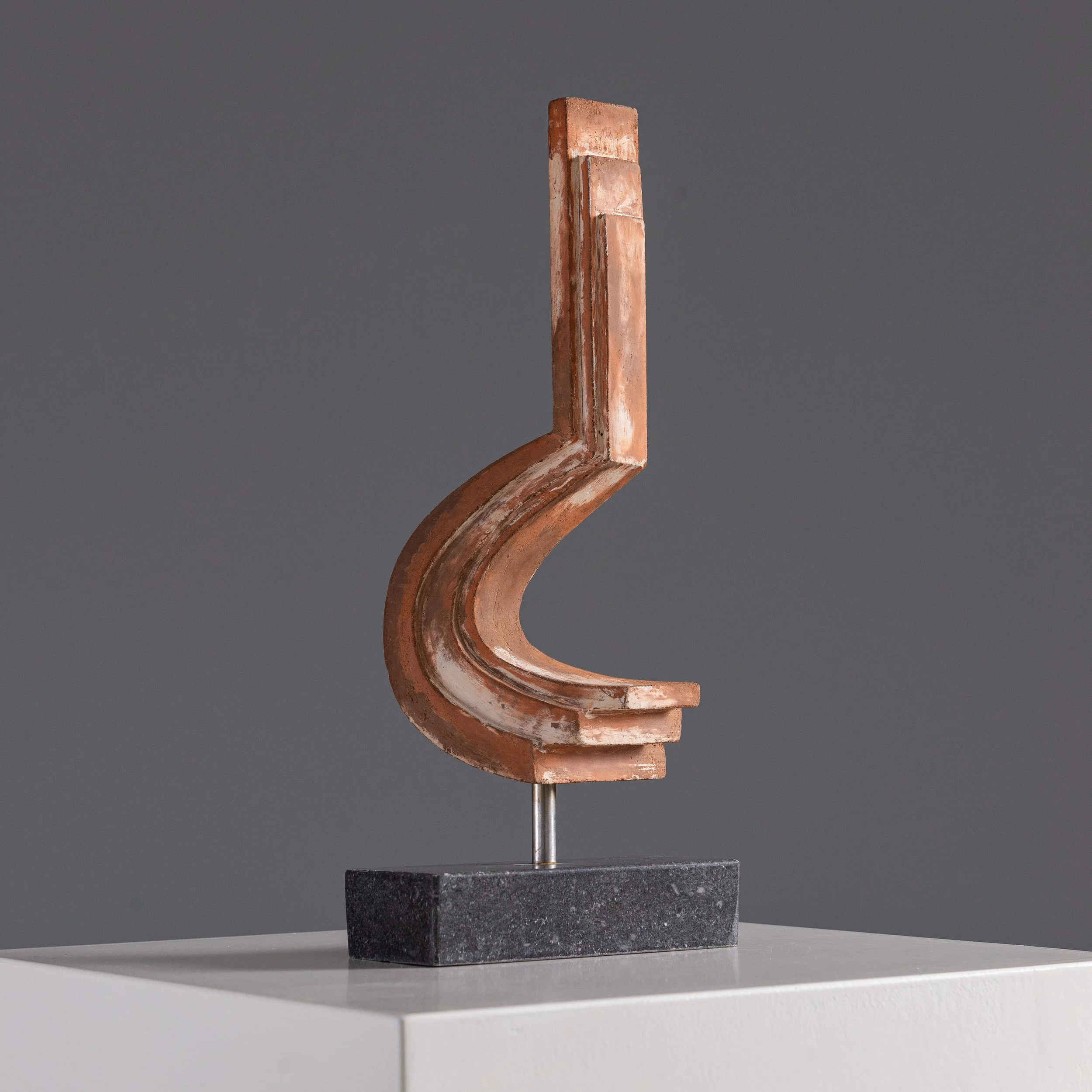 Terracotta sculpture on granite base