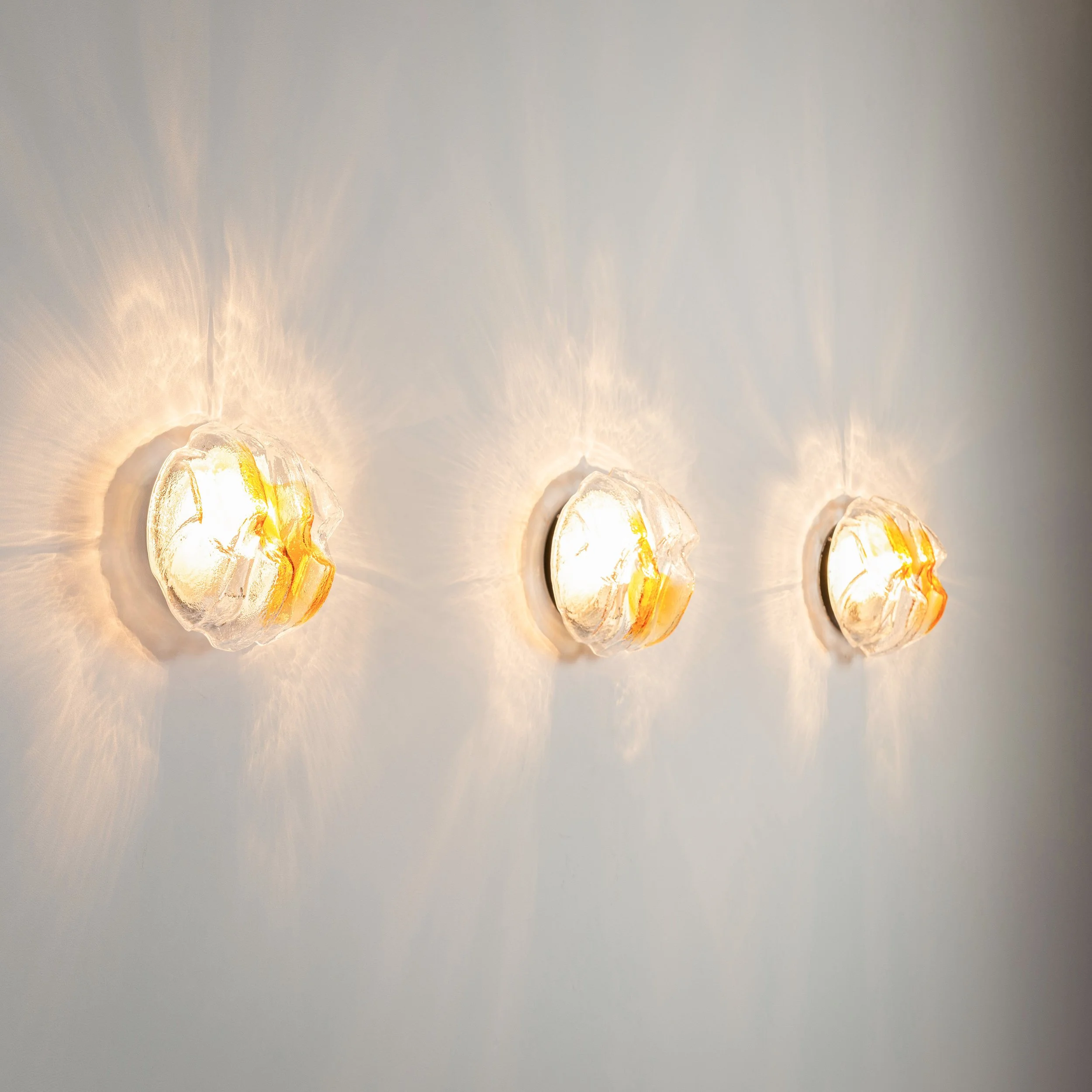 Set of three Murano glass wall lamps