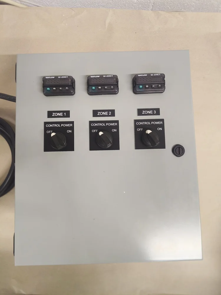 Door with three Watlow EZ-ZONE PM controllers and zone power switches