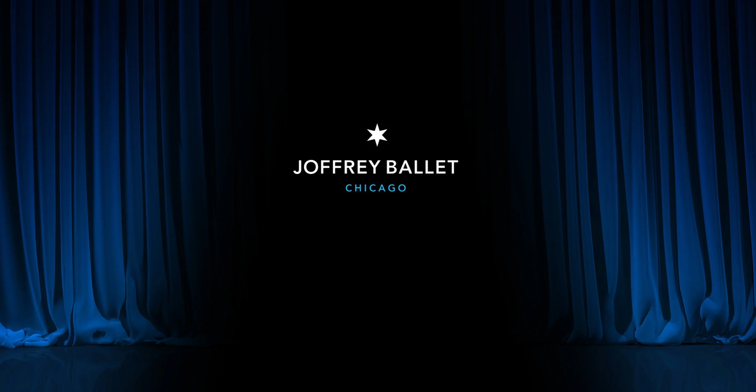 The opening curtain of a stage with the text 'Joffrey Ballet Chicago' and a star logo in the center.