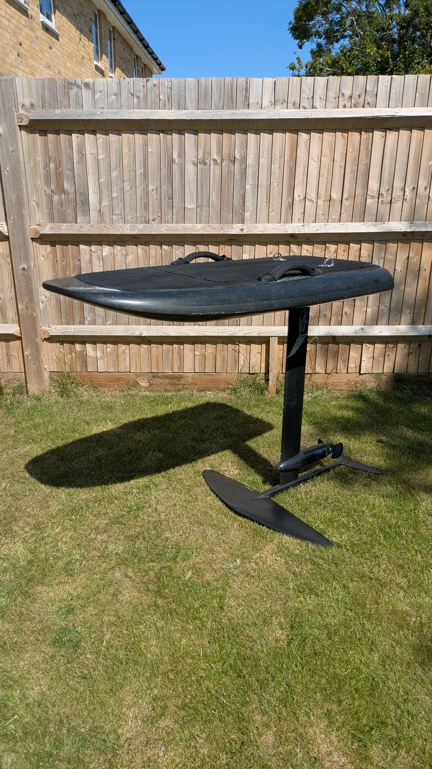 LIFT3 Carbon Black 4ft 2 Pro efoil standing up