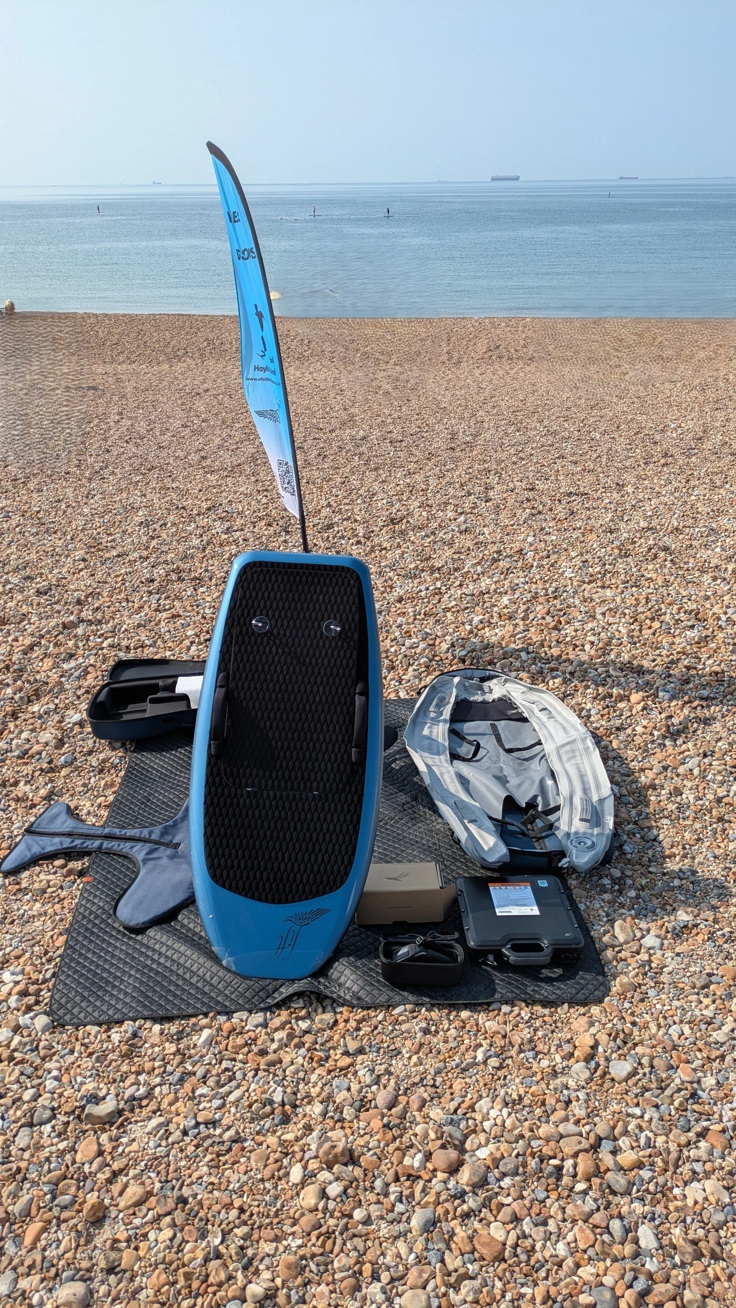 Blue 4ft 9 sport efoil on the beach