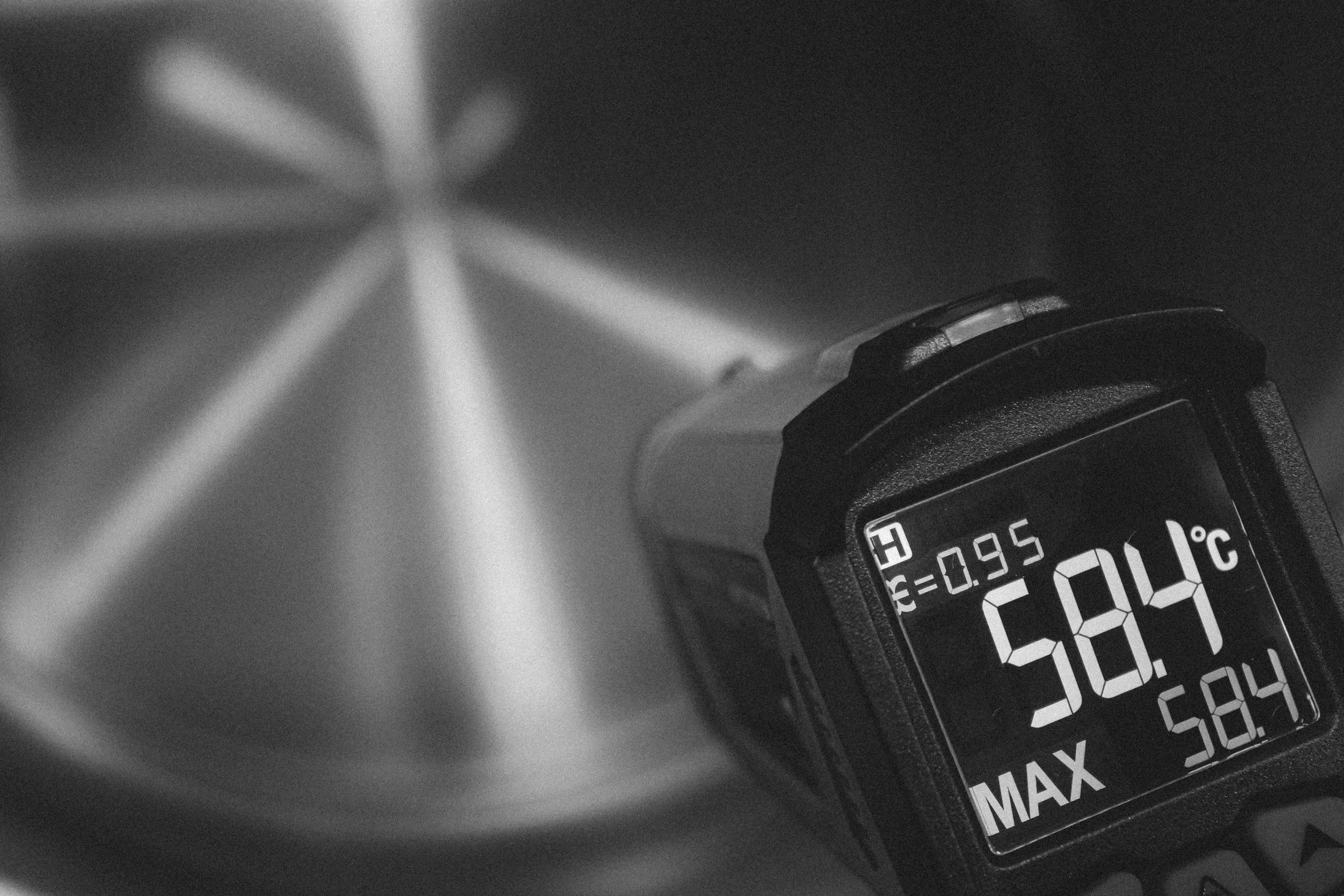 pot of water with thermometer for sous videshowing 58.4 degrees celcius.