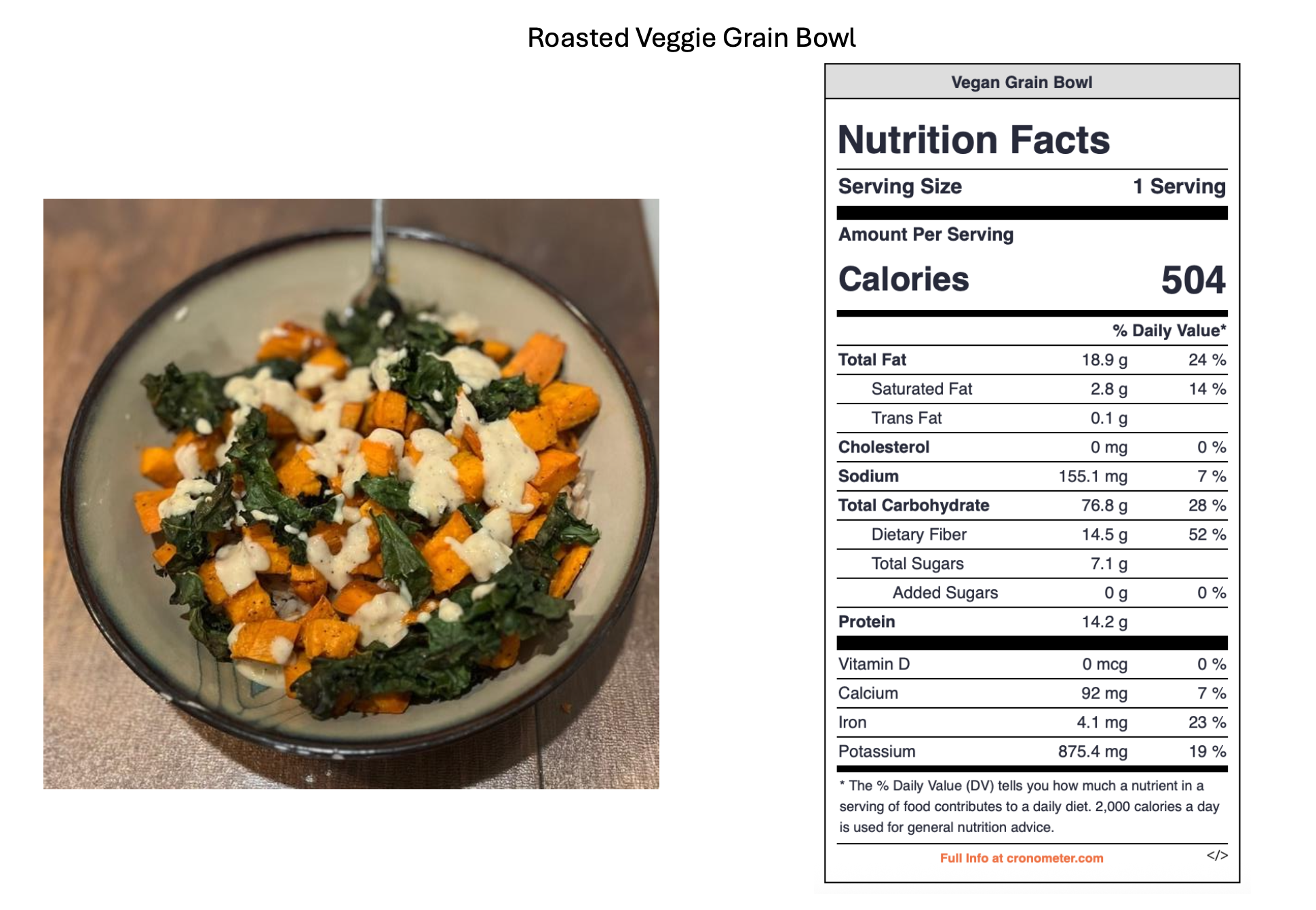 A bowl of roasted veggie grain salad with orange sweet potatoes and kale, topped with vegan dressing.