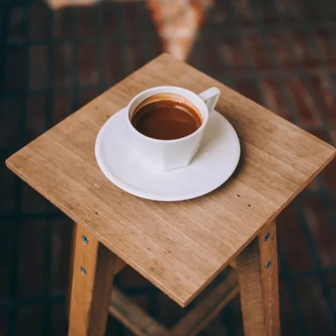 long-espresso-sits-on-a-wooden-stool_1000x1000.webp