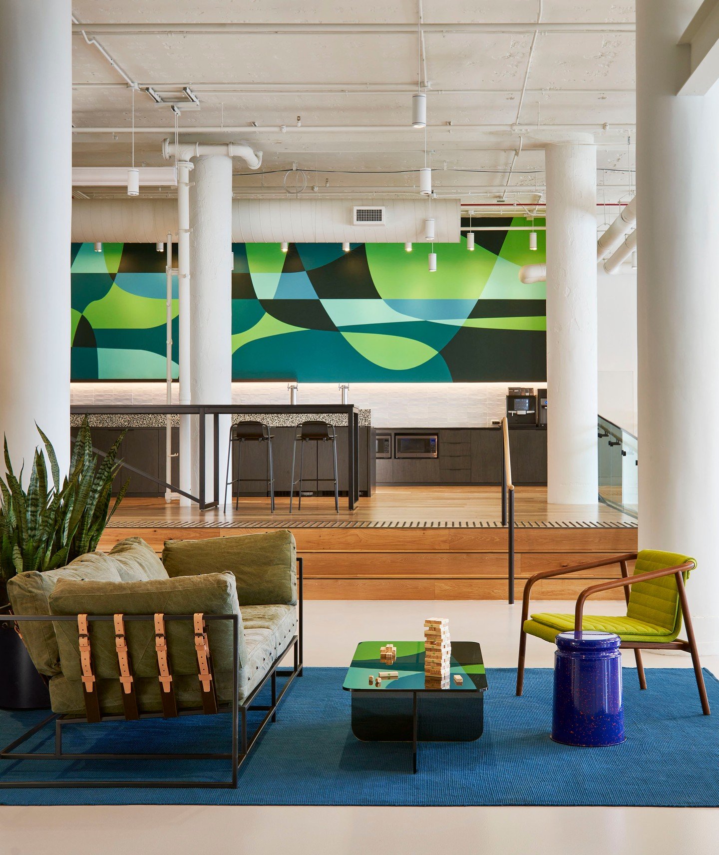 We haven't done a #ThrowbackThursday in a while, so here's one of our favorites, @numeratorone, located at @24eastwashington . Soaring ceiling heights allowed us to create an elevated area in the central cafe space. The mural, created by our friends 