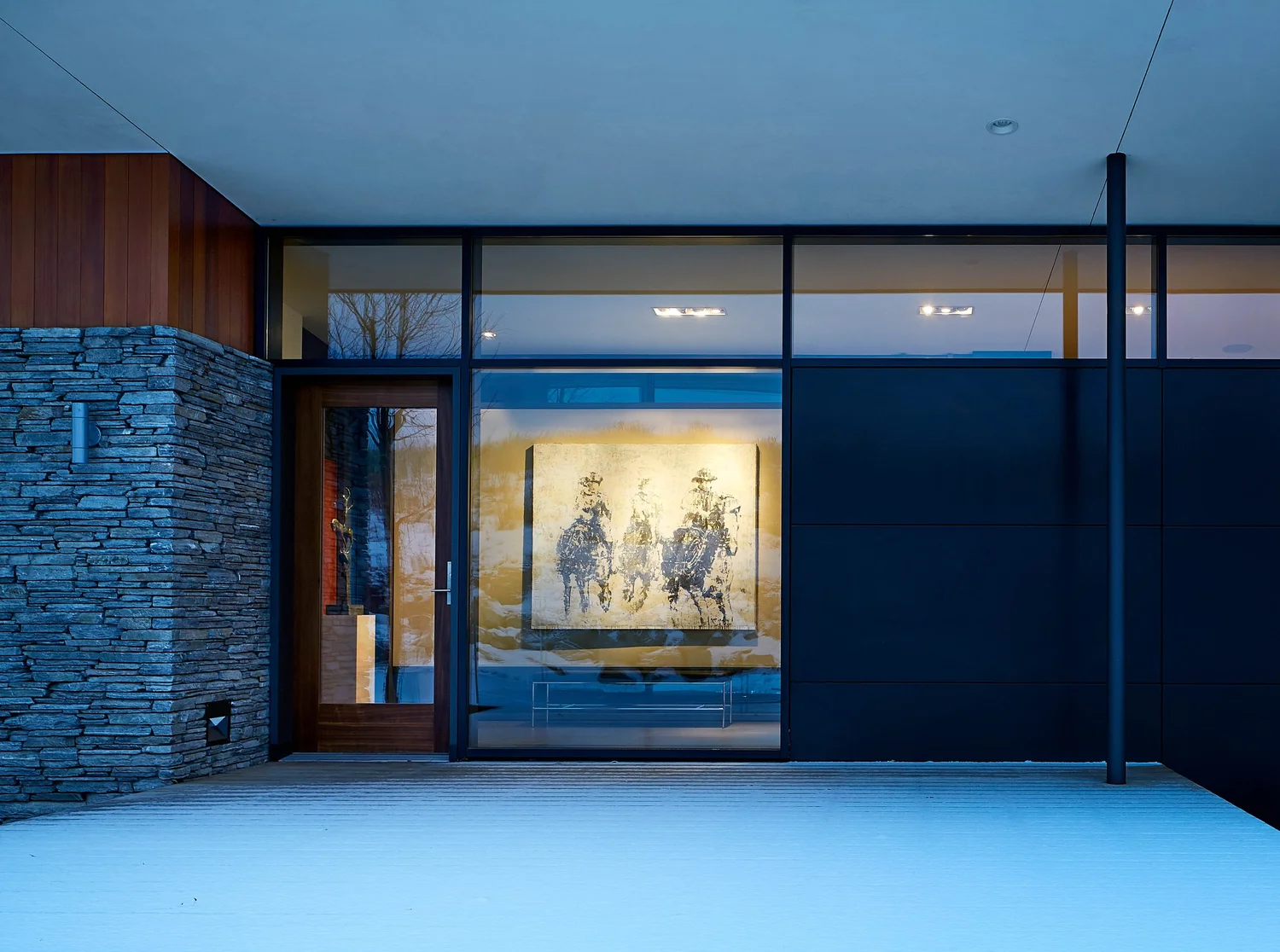 Night entry of the Ridgeline Residence, a modern Jackson Hole home by WELCH Architecture