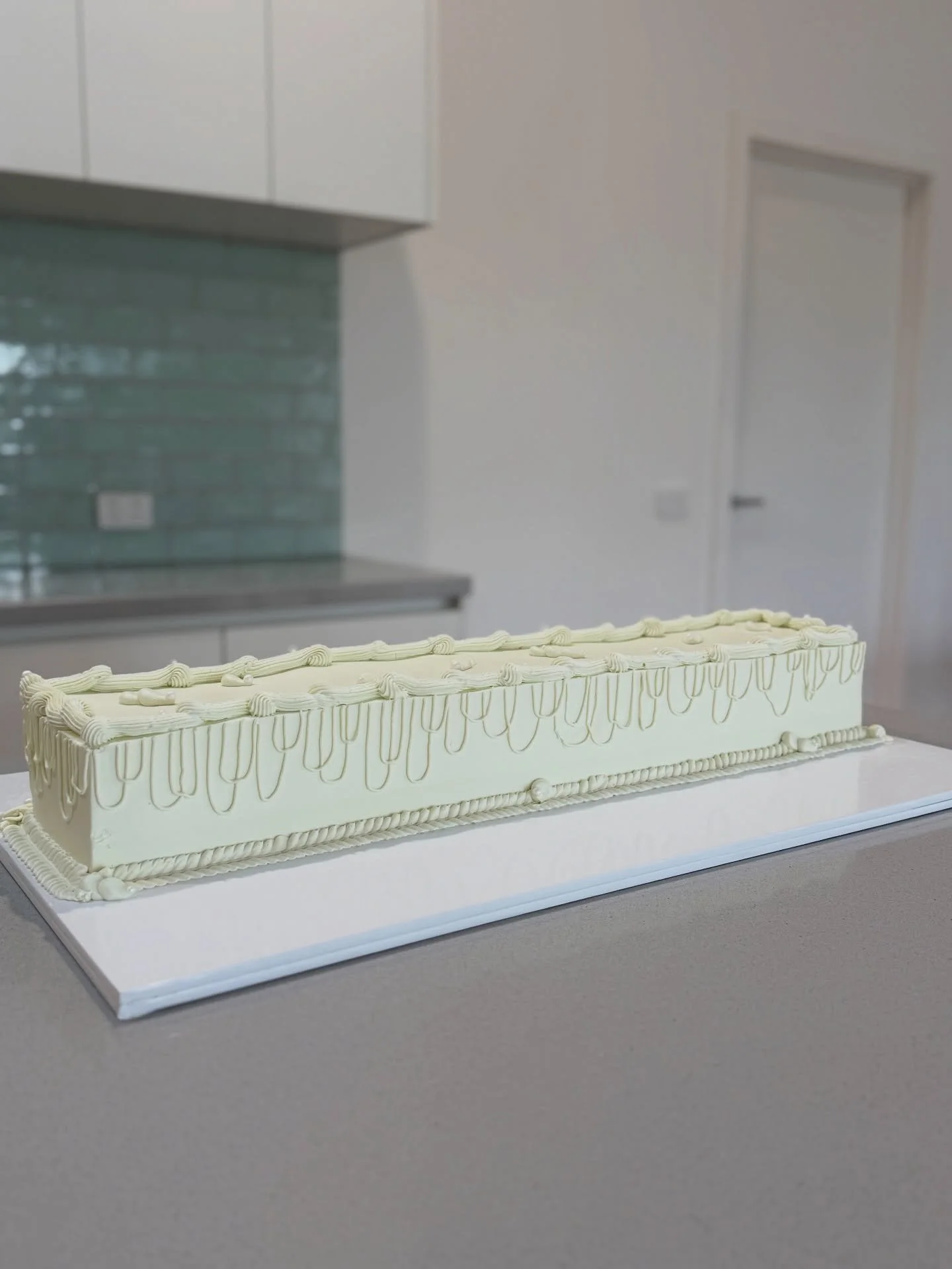 If you know anything about cake decorating, (and unless you are a magician 🪄 - if so please give me all your tips) then you would know the stress this wedding cake caused me the whole week prior. Drop ropes are the stuff of nightmares, and this babe