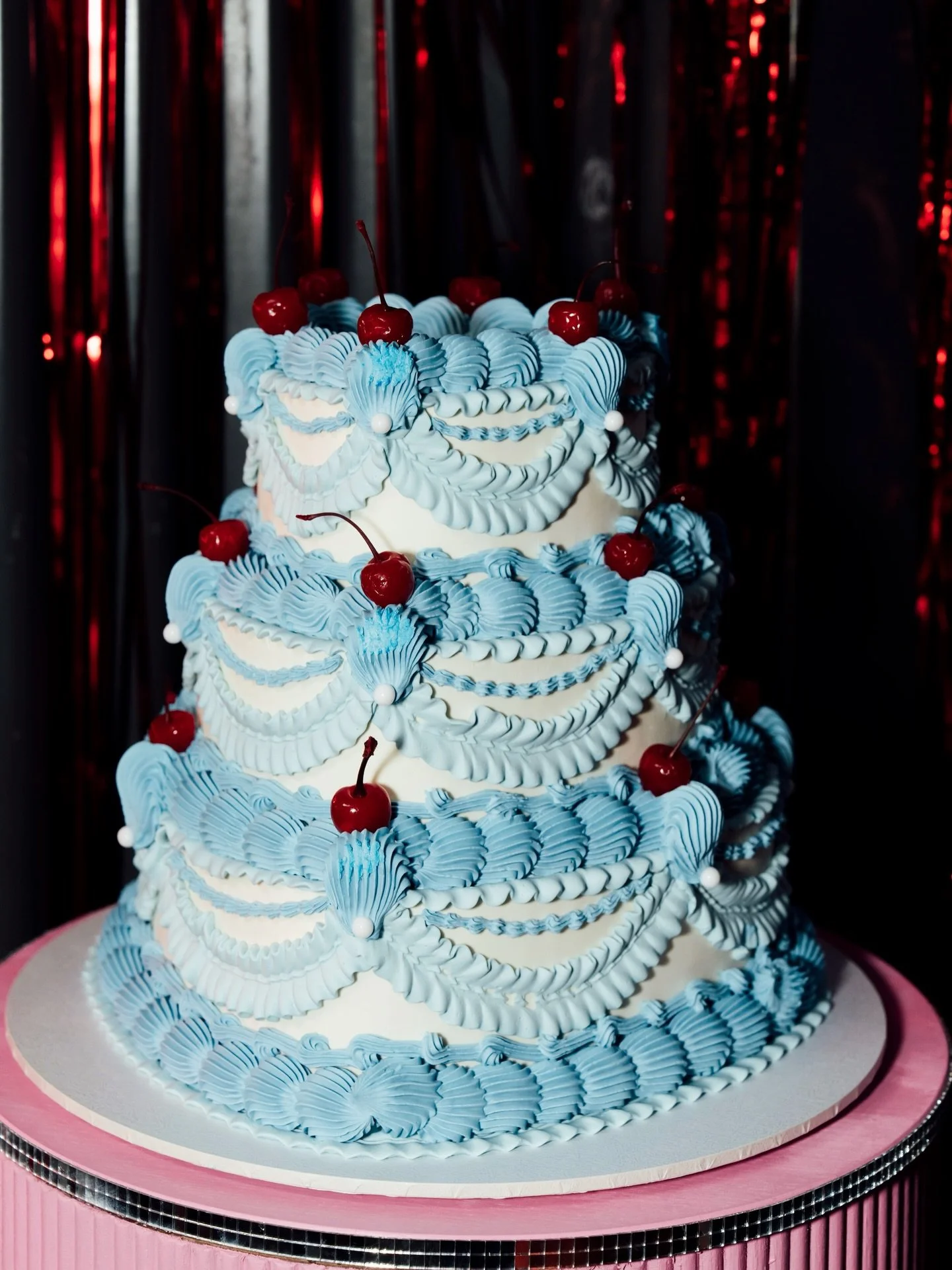 Your wedding cake should always reflect you as a couple, not necessarily the latest trend. 

Rick and Rach&rsquo;s cake did just that. With the colour matching Rick&rsquo;s suit and the vibe being uniquely theirs. 💙🤍🍒

The sweetest topper to compl