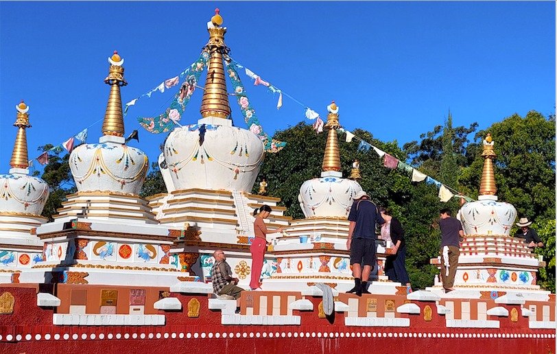 We warmly invite you to join us this Saturday, 12th of July, for a special working bee in the Garden of Enlightenment. Together, we’ll lovingly continue to clean and paint the beautiful Stupas—helping to preserve their splendour.
It&rsqu