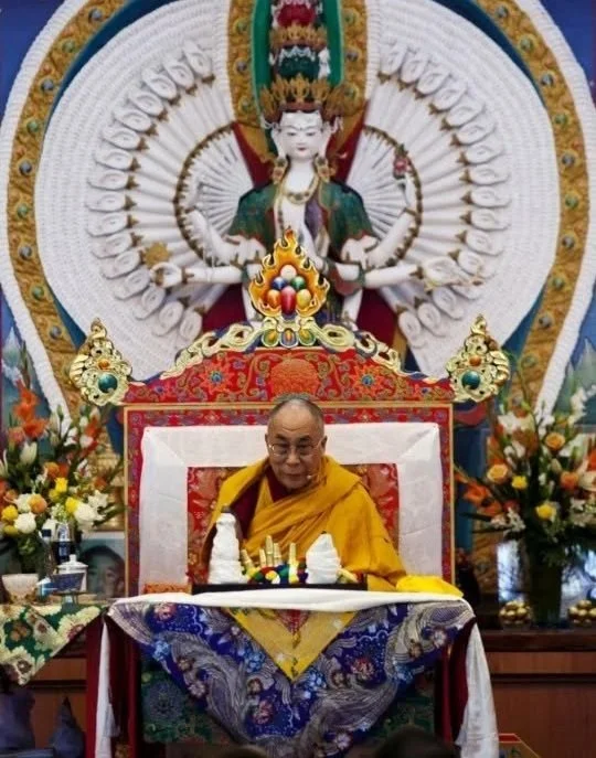 His Holiness the 14th Dalai Lama in front of Chenrezig