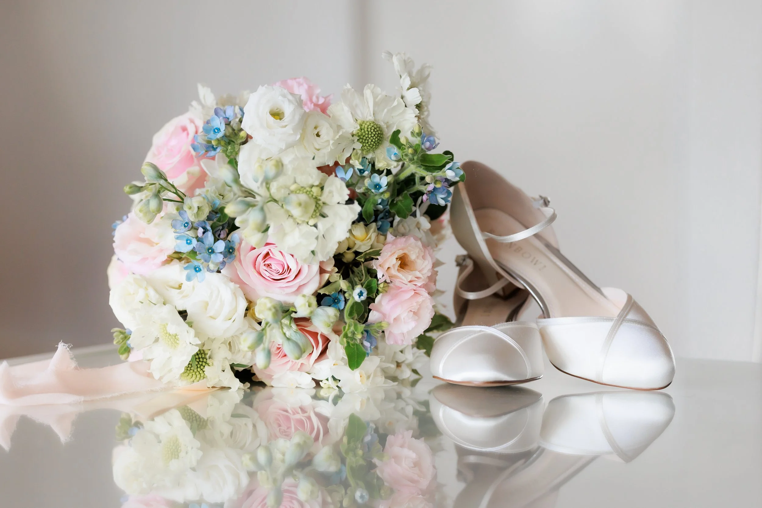 Garden-style bridal bouquet featuring seasonal flowers, handcrafted by Pash Flowers, Melbourne wedding florist.