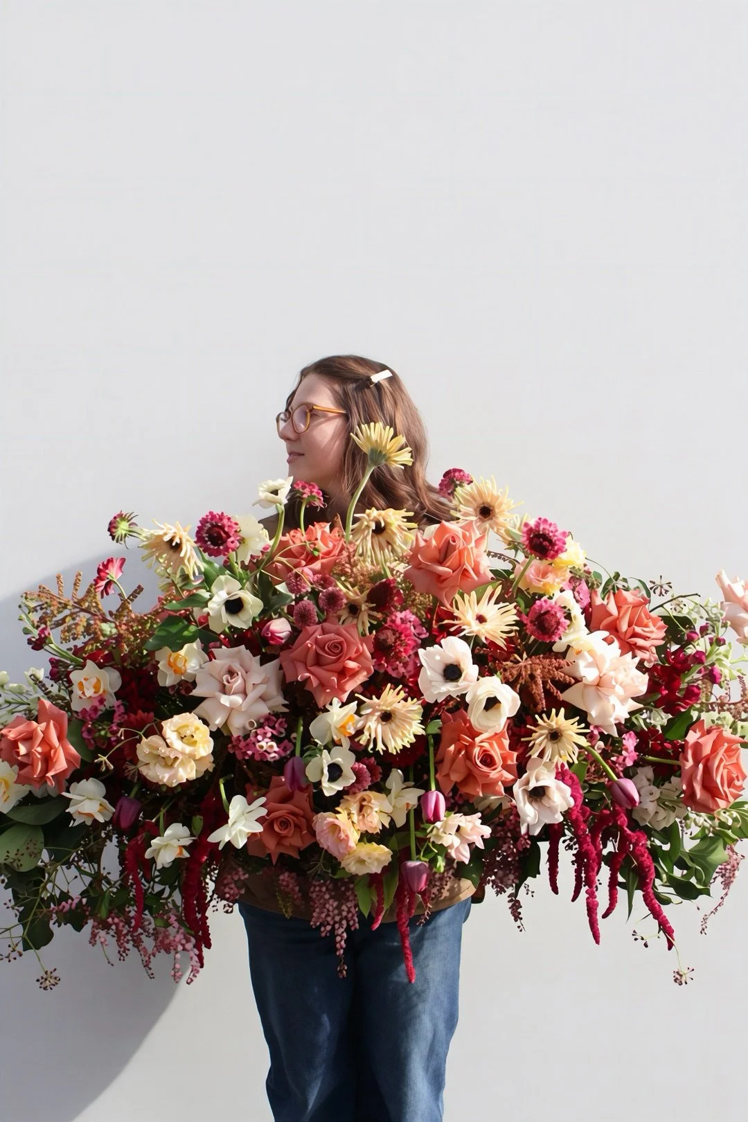 Luxury casket spray featuring premium seasonal blooms, custom designed by Pash Flowers for funeral services across Melbourne.