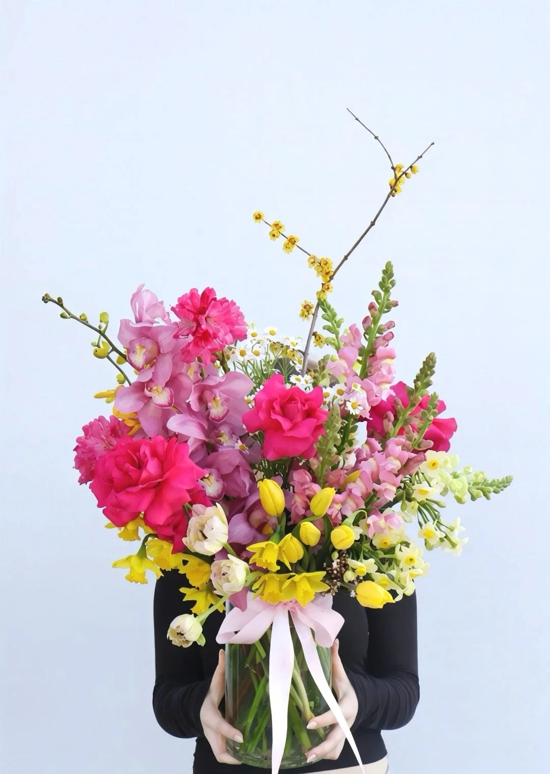 Pash Vase Arrangement featuring a florist's choice of fresh seasonal flowers in a stylish glass vase by Pash Flowers Brighton.