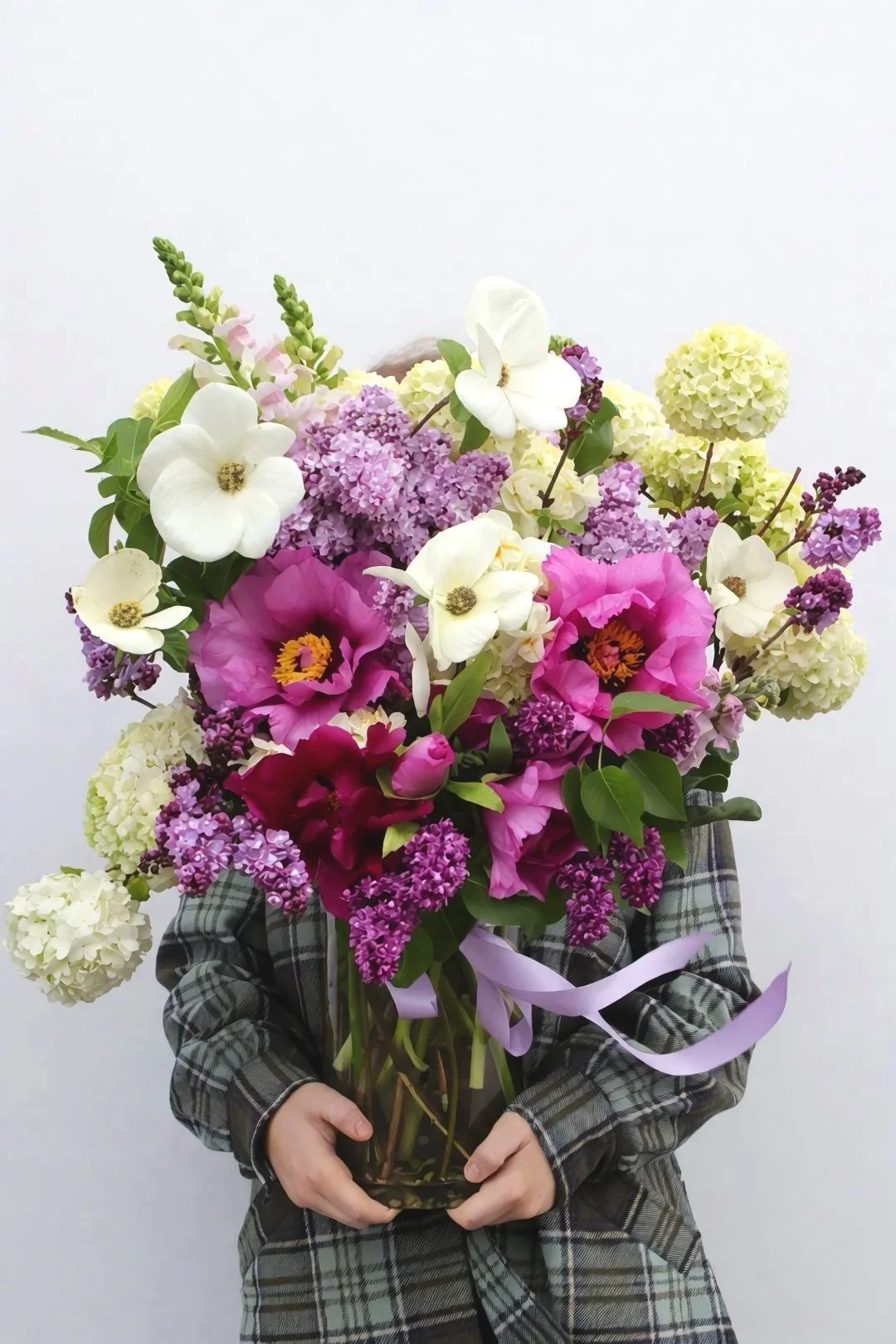 Pash Vase Arrangement featuring a florist's choice of fresh seasonal flowers in a stylish glass vase by Pash Flowers Brighton.