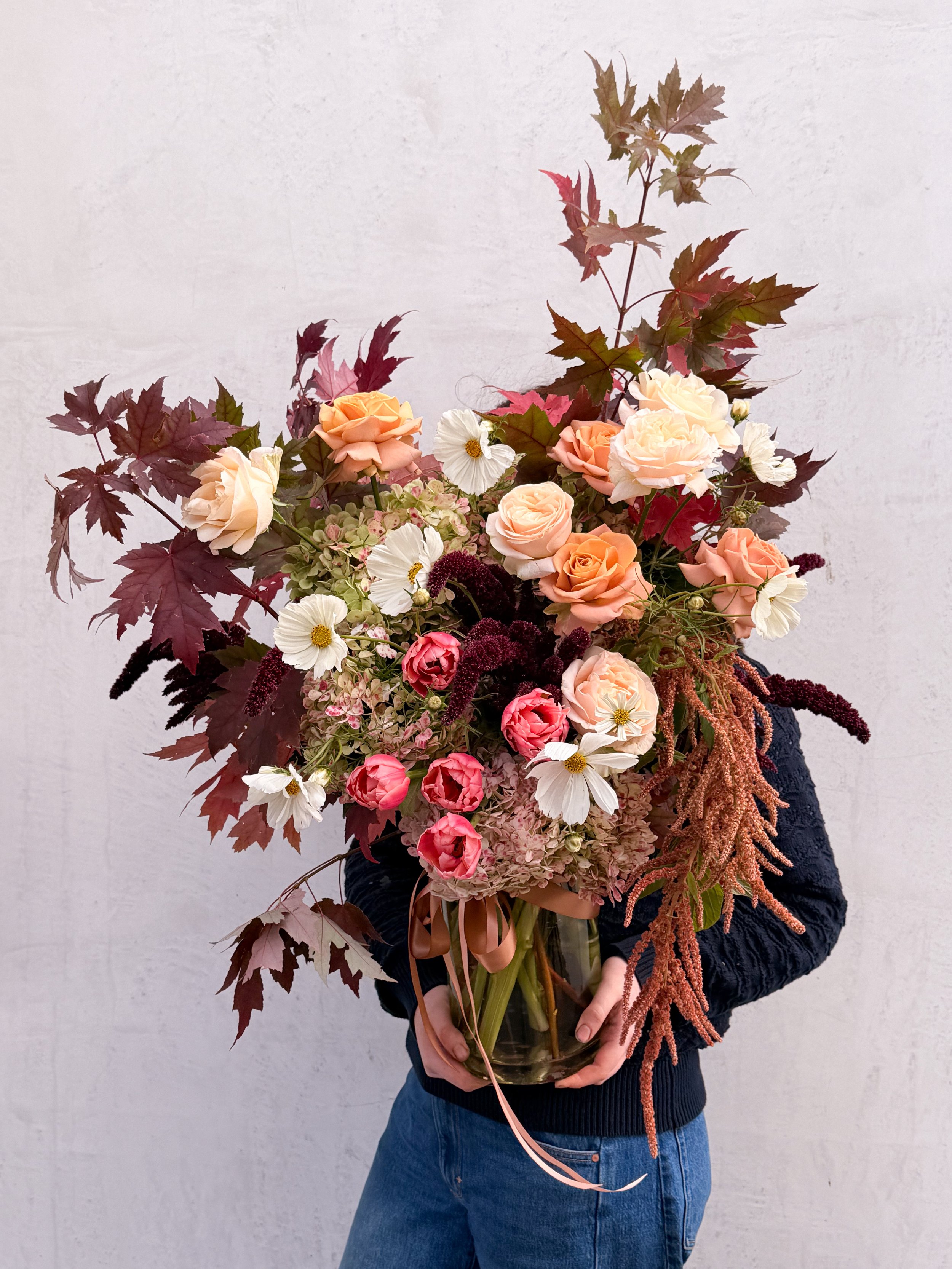 Autumn-style-mothers-day-flowers-held-by-a-girl