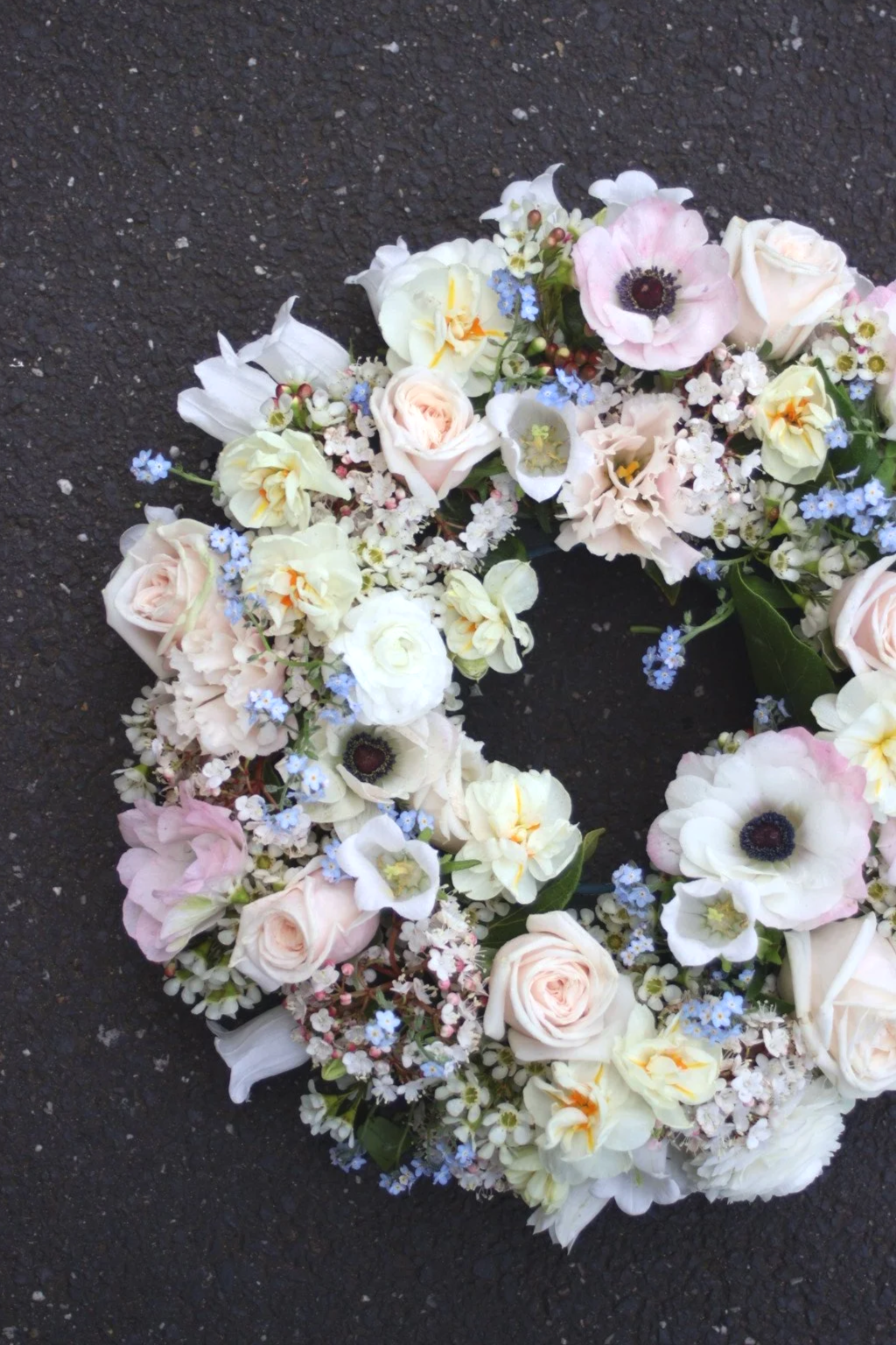 Garden style sympathy wreath handcrafted with fresh seasonal flowers by Pash Flowers Brighton.