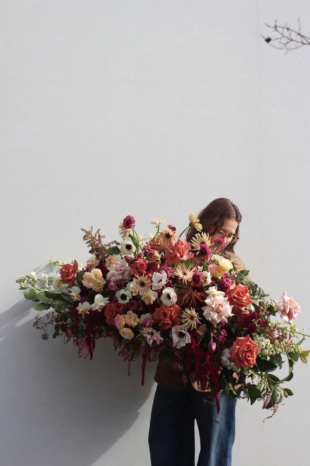 Elegant luxury funeral flowers with an abundant garden-style casket spray, handcrafted using premium seasonal blooms by Pash Flowers, Melbourne.