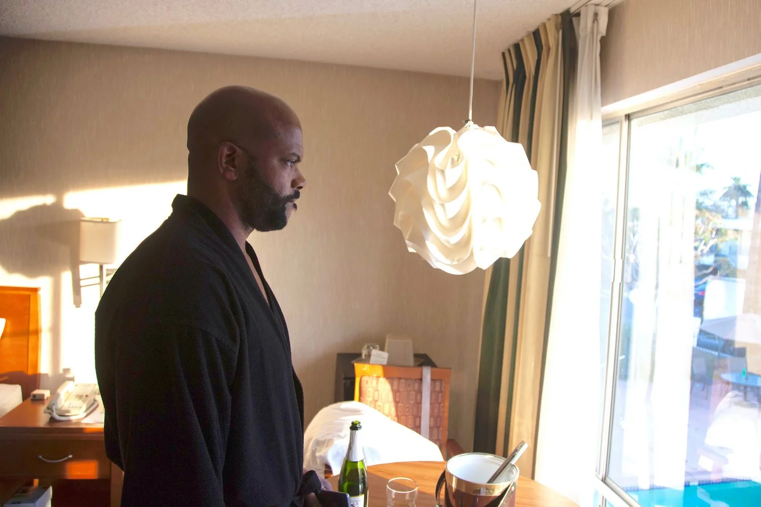 Production still of Monti Sharp in the short film LUX IN EFFECT.