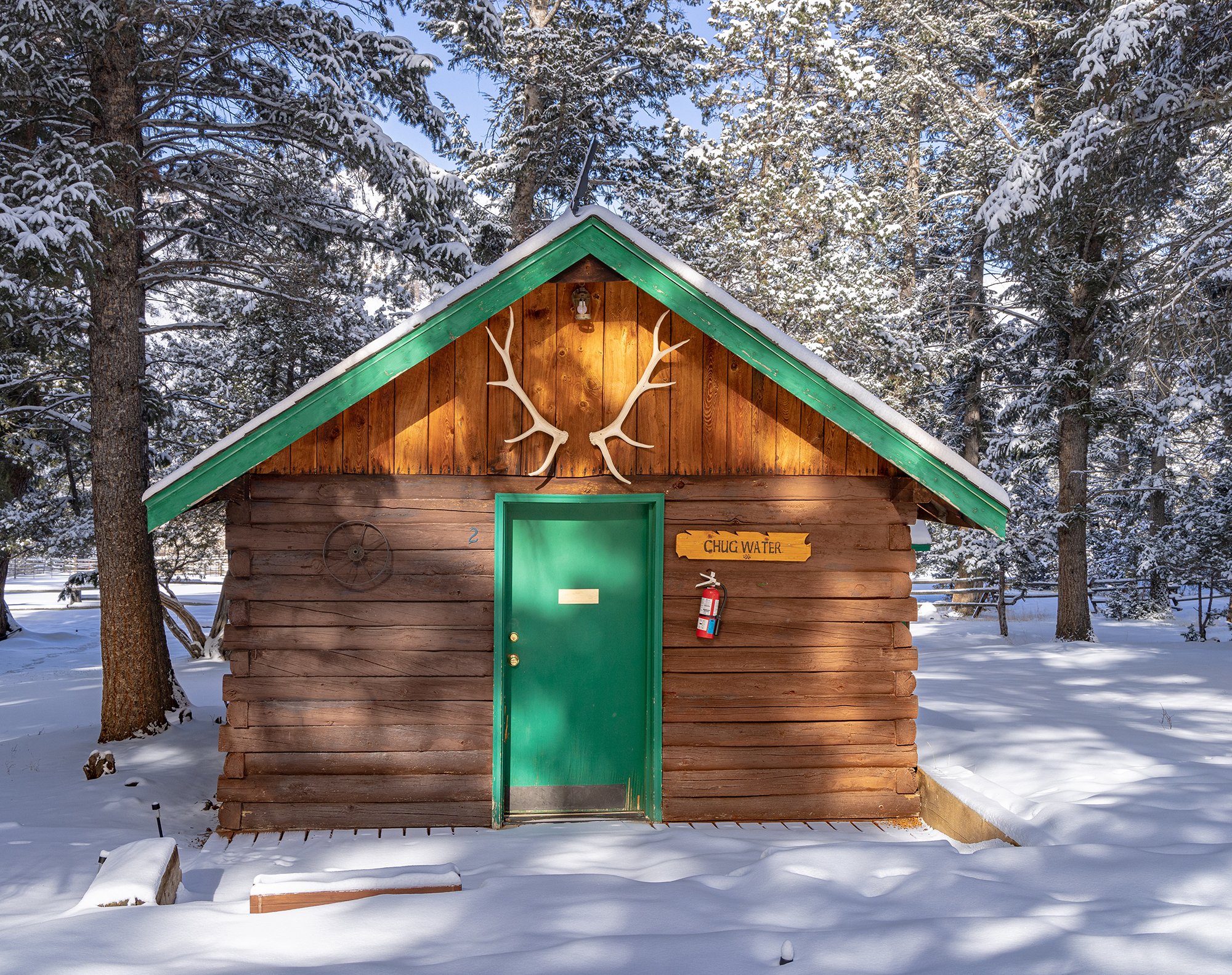 chug water cabin at UXU Ranch winter view of front entrance.jpg
