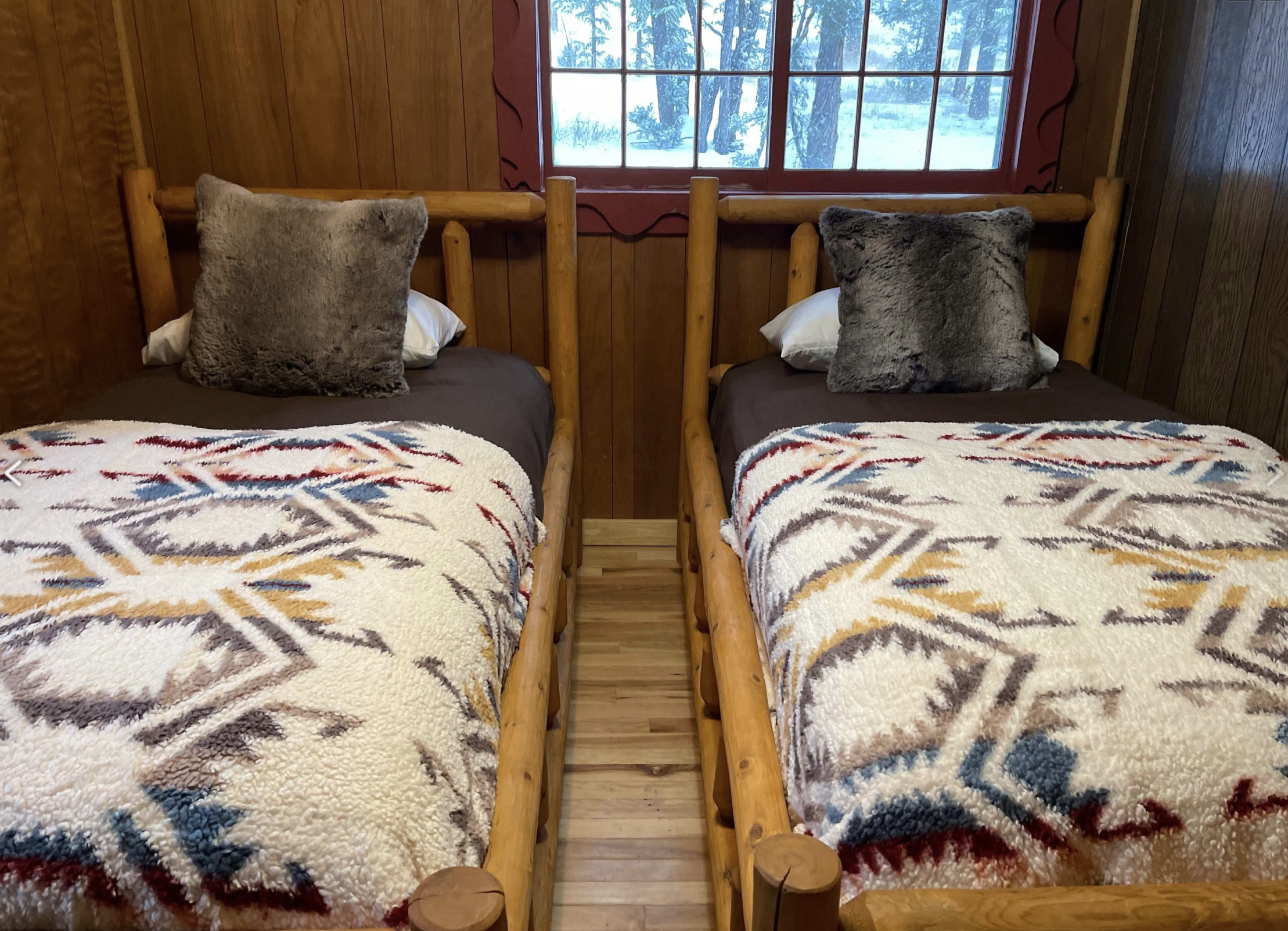 medicine Bow twin beds inside the cabin.png