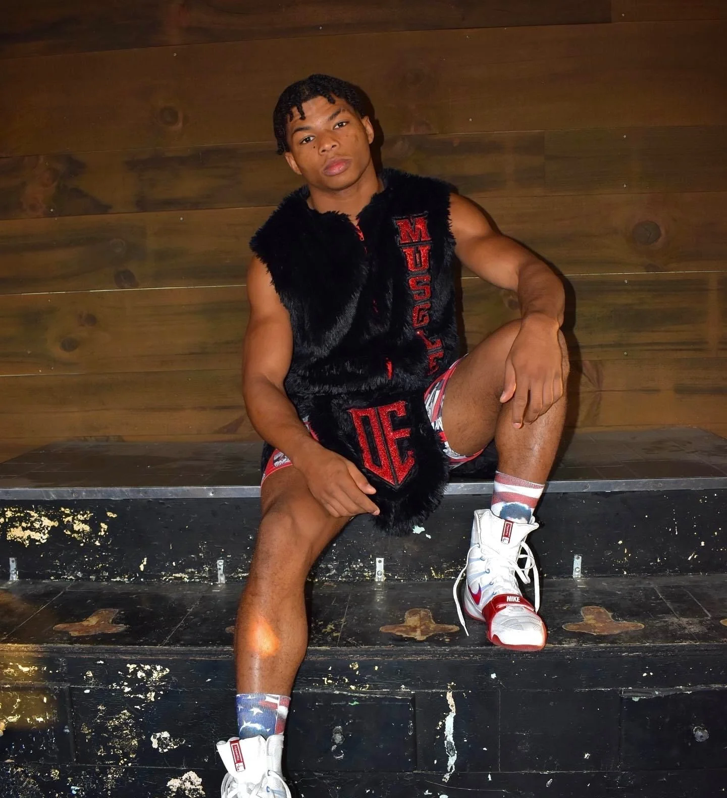From Wrestling Mat to Boxing Ring: Deangelo 'Muscle' Evans Shares His Journey in Exclusive Interview