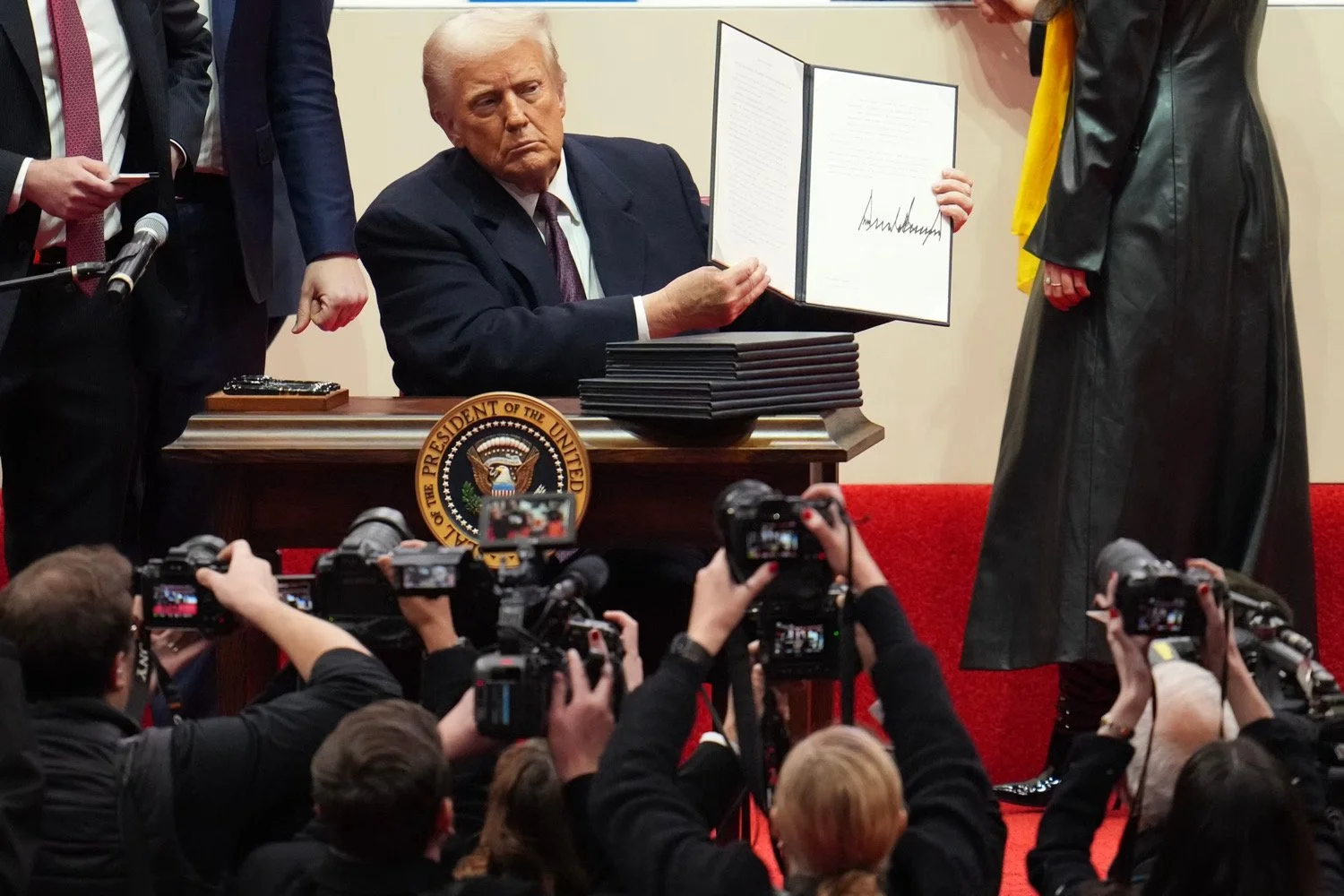 Trump Administration Pauses Federal Grants and Loans, Sparking Confusion and Legal Battles