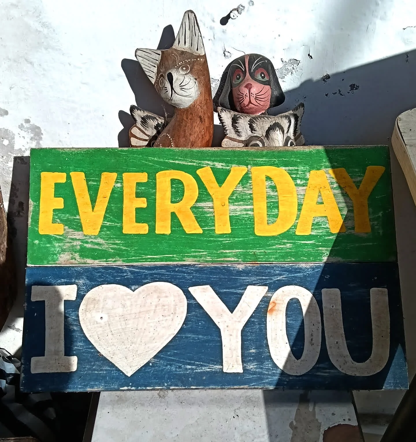 That's one of the reasons we adore Bali &mdash; especially Ubud. It's full of these perfectly imperfect, artsy surprises. A painted sign tucked into the trees, a mossy statue with sunglasses, a shrine with marigolds and a cat lounging beside it&helli