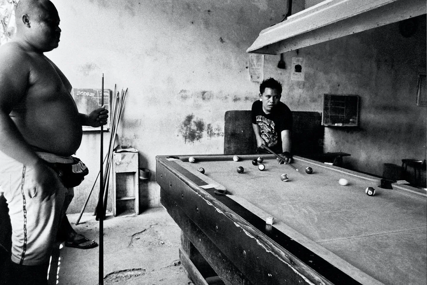 And the game goes on...

The ashtrays fill, the beer flows, and the cue sticks never rest for long. In this final image from our &ldquo;Pot Black&rdquo; series, the players are locked in &mdash; focused, steady, and completely in their element.

This