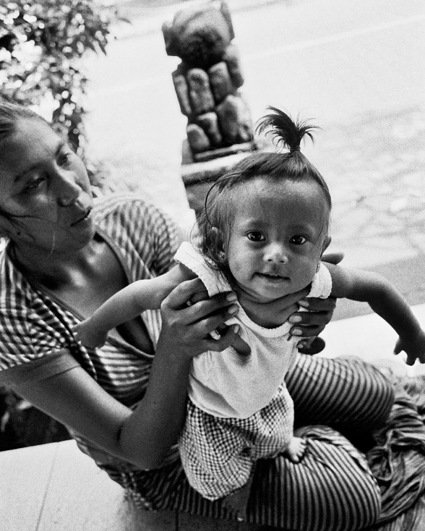 There's something timeless about a beautiful black &amp; white photograph.

This piece, inspired by the warmth and beauty of the Balinese people, captures a quiet moment between mother and child &mdash; soft, soulful, and full of feeling.

Black-and-
