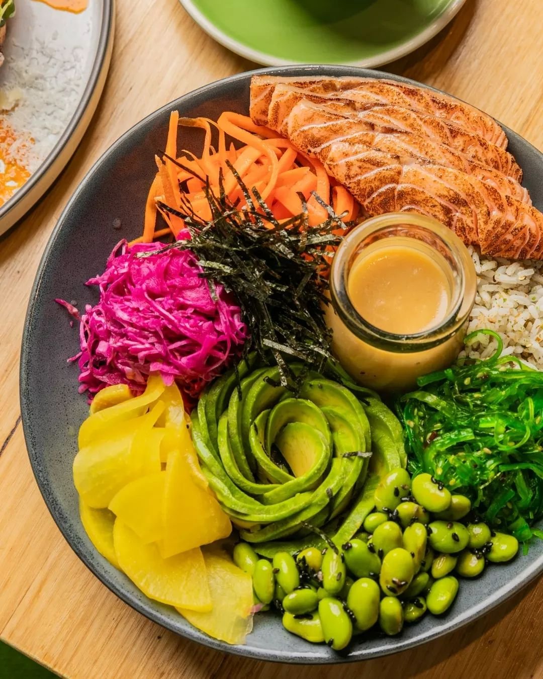 🤷🏽&zwj;♂️&nbsp; Why settle on a limp pile of lettuce, when you can dig into our new Salmon Pok&eacute; Bowl, with torched salmon, seaweed salad, edamame, pickled carrot, shredded nori, avocado, salted cabbage &amp; pickled daikon on rice? 

Drop in