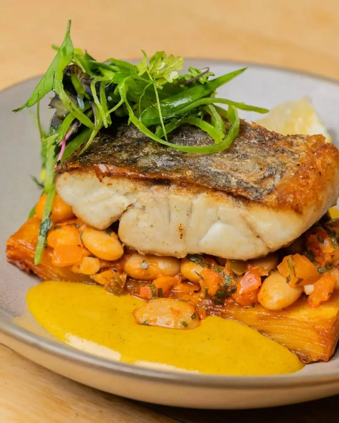 Our Grilled Barramundi is one of those dishes you think about days later &ndash; especially that deliciously crispy potato galette. 🤤

Reel in a serve now that it's back on the pass. Sea you soon 🌊