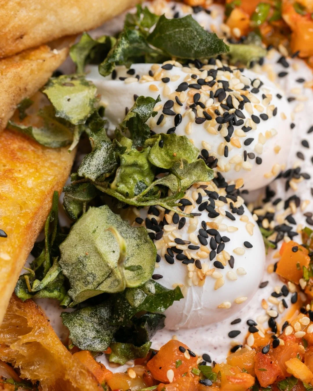 Bold flavours, soft eggs, zero regrets: our Turkish Eggs are a brunch favourite for good reason.

With poached eggs on whipped sumac yoghurt with ezme salsa and fried herbs, we serve this exotic beauty with grilled Turkish bread so you can mop up eve