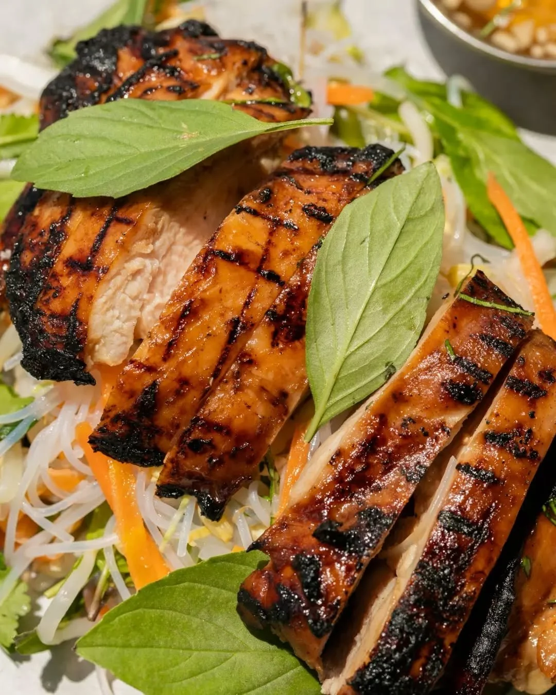 The kind of salad that isn't really &ldquo;a salad&rdquo;: lemongrass chicken, noodles, herbs, crunch, pickles and a punchy nuoc cham dressing, with mini spring rolls on the side.

Our Chicken Vermicelli Salad packs big flavour, with a bright finish.