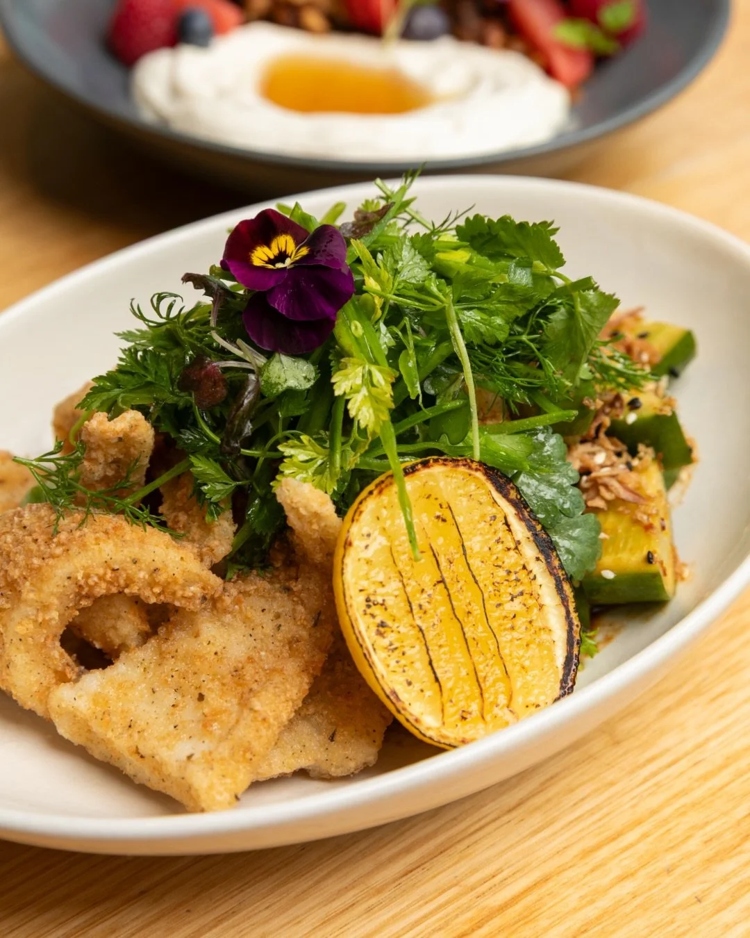 Fresh enough to feel like summer, even if Melbourne says otherwise. 🍃

Flash fried calamari with smashed cucumber salad, crispy chilli, snow peas and coriander for the kind of bright, crunchy lunch that just works 👌🏼

Our Calamari Salad is a taste