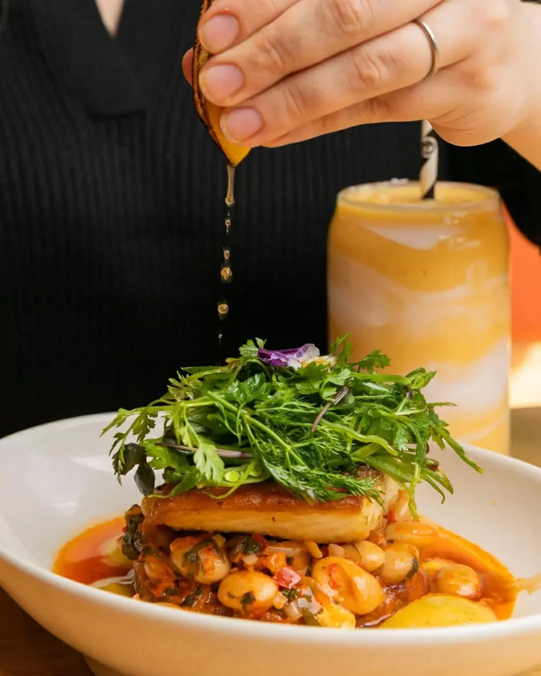 That lemon squeeze really brings it home 🍋  Let our Grilled Barramundi brighten the middle of your week with its tomato and white bean salsa, soft herbs and batata harra beurre blanc finish. 

Food for the soul, with none of the heaviness. 🐟